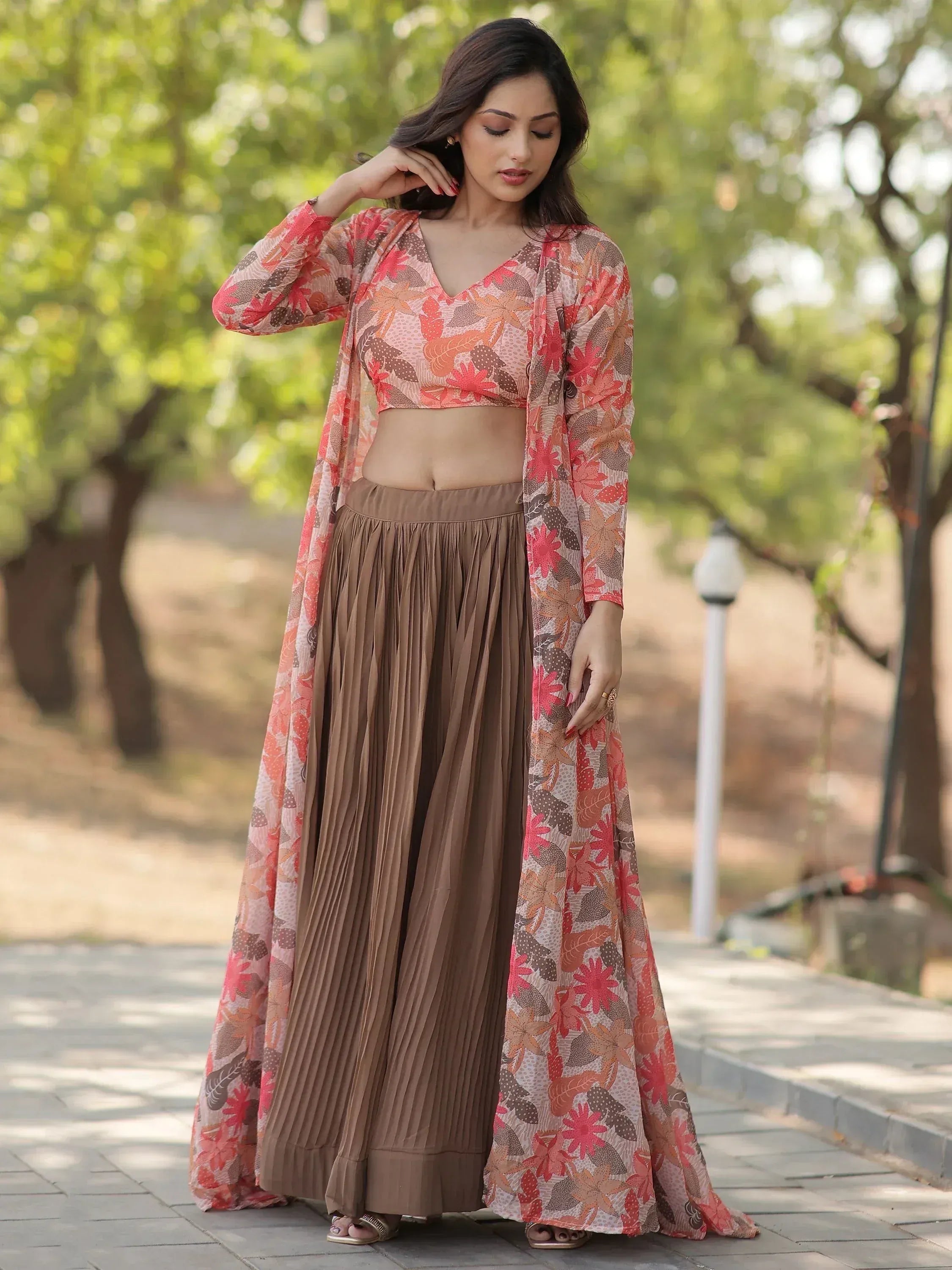 Floral print ethnic crop top with pleated skirt and long shrug, perfect for Indian occasions