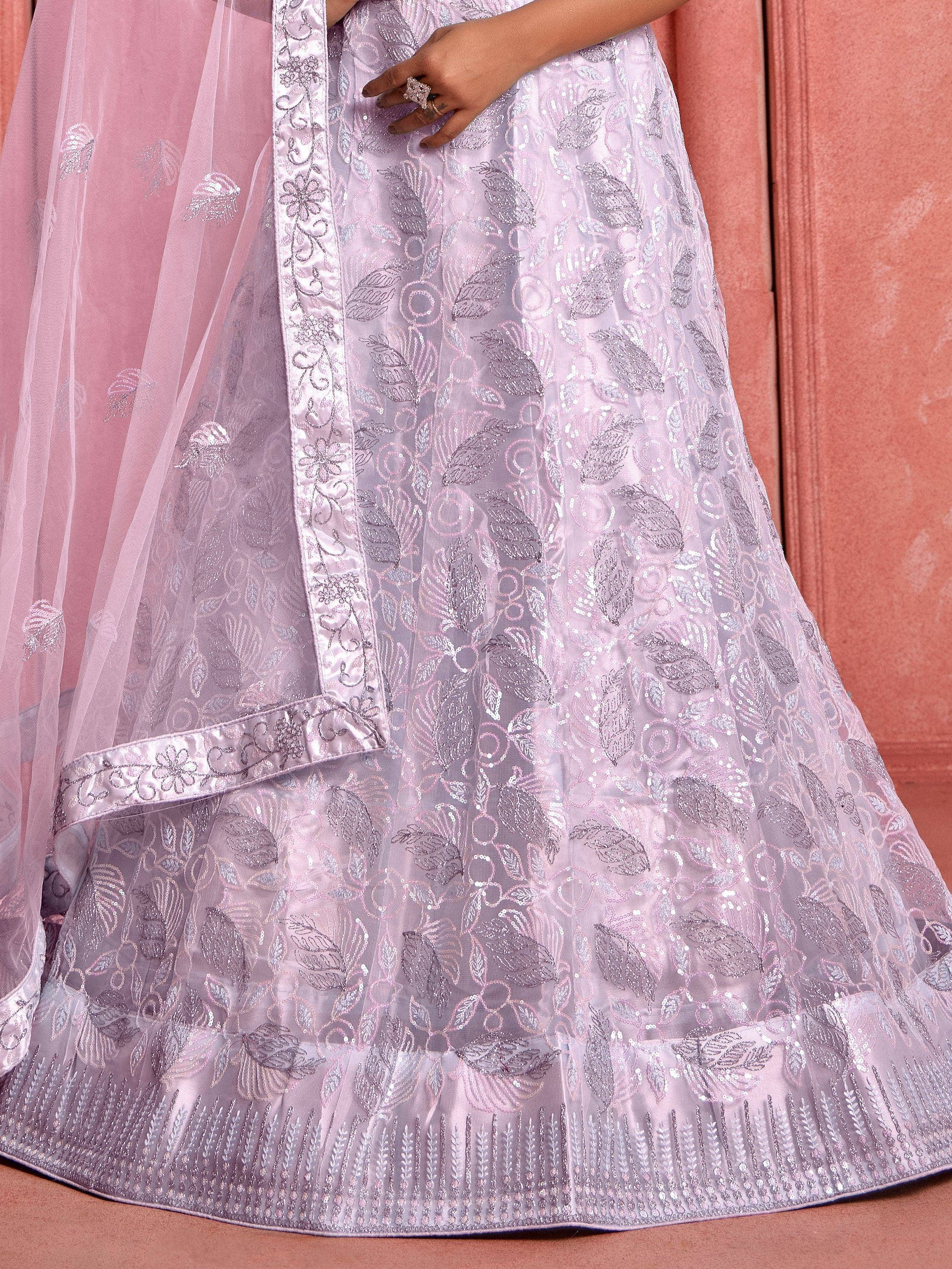 Light pink embroidered lehenga with floral sequin work and sheer dupatta, perfect for Indian ethnic occasions.