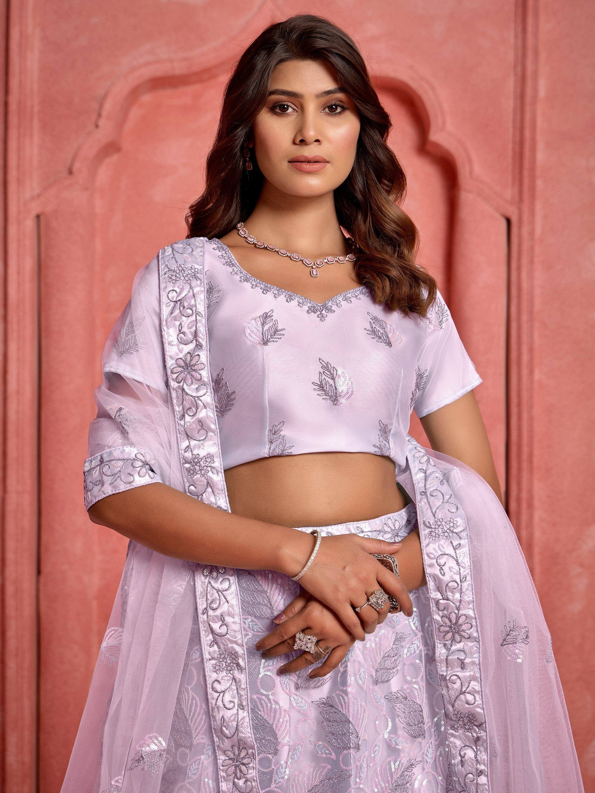 Lavender embroidered lehenga choli with floral motifs, perfect for Indian ethnic wear occasions.