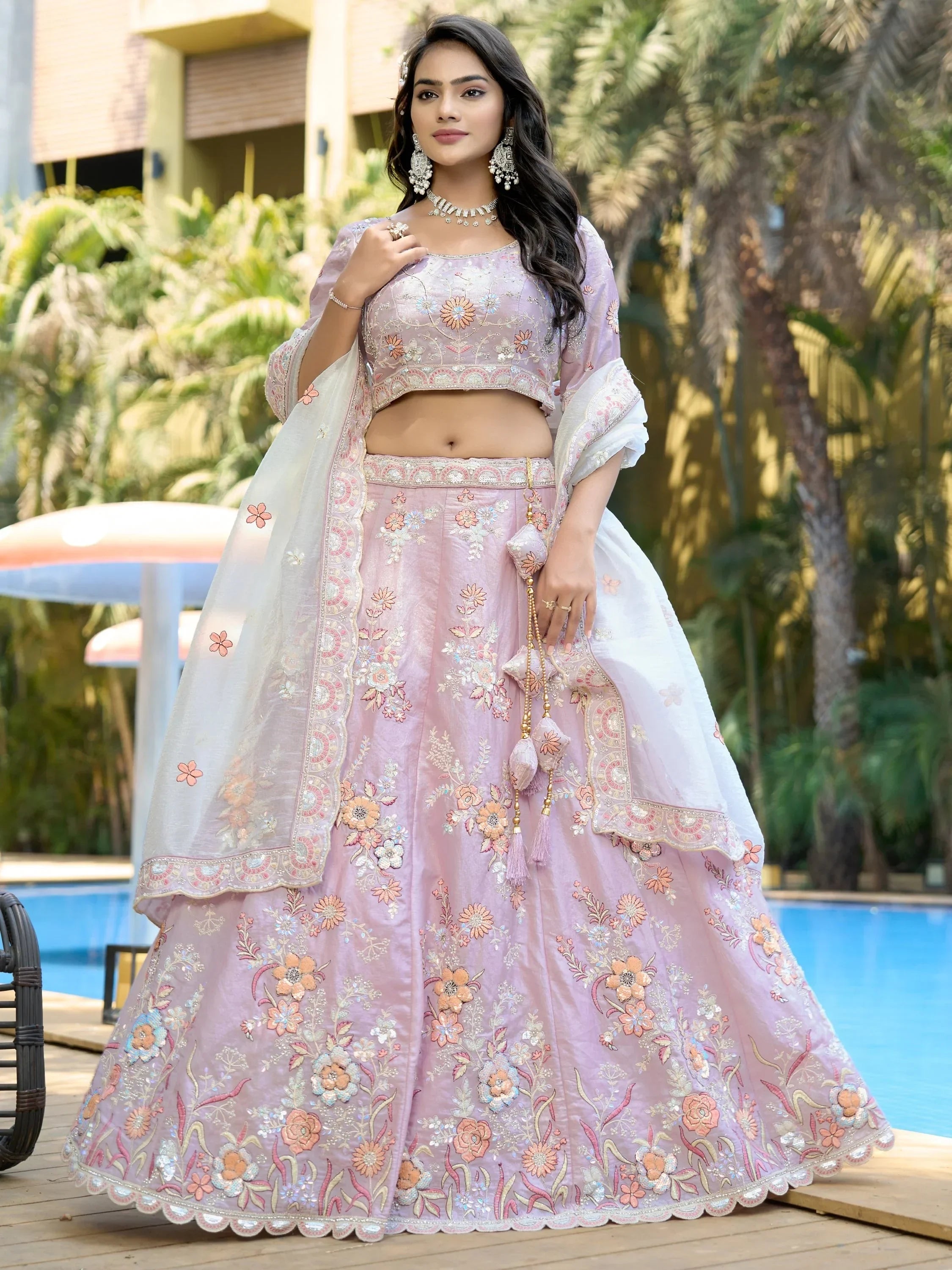 Pink floral embroidered lehenga choli with dupatta, perfect for Indian weddings and festive occasions