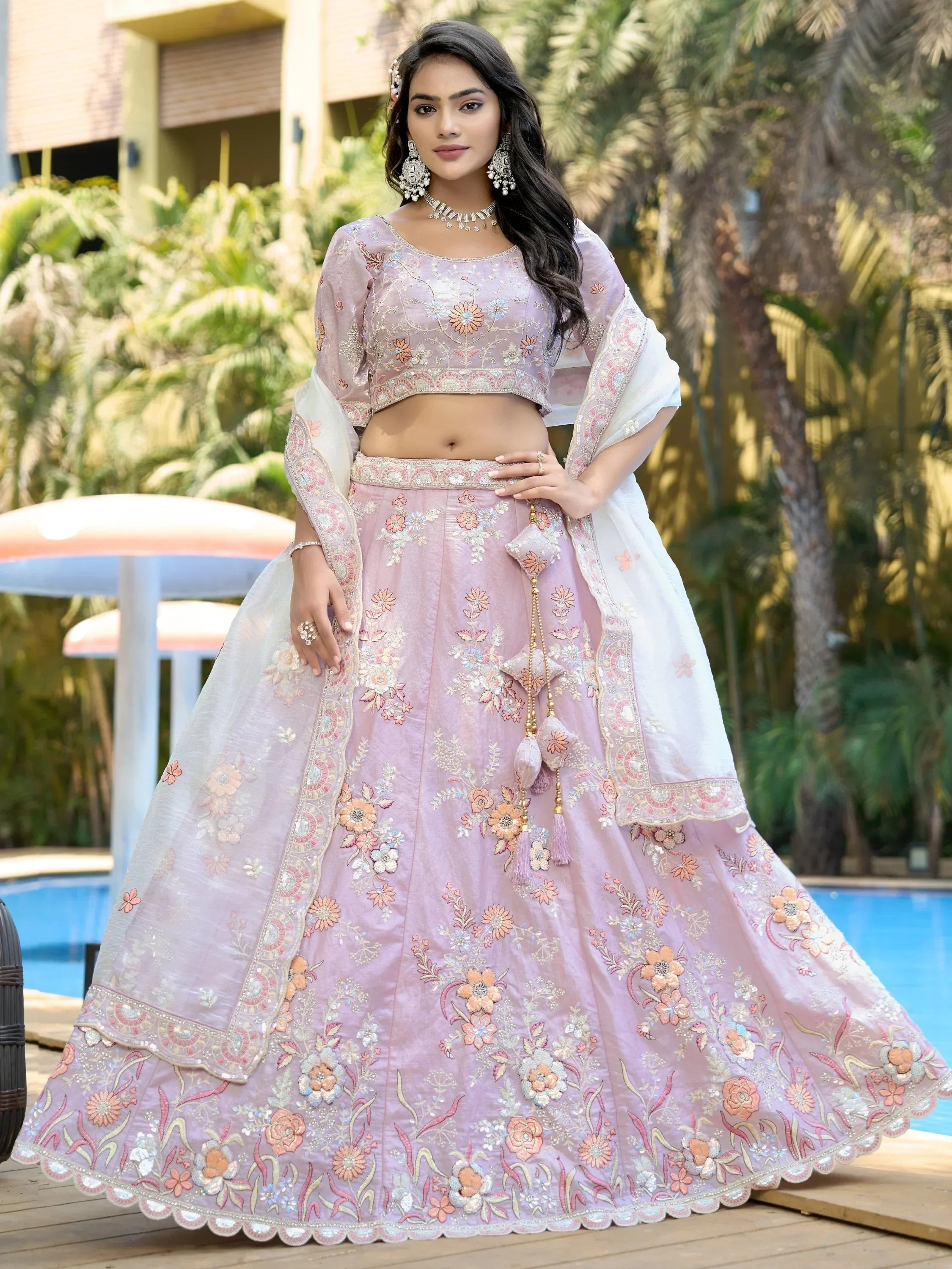 Pink floral embroidered lehenga choli with dupatta, perfect for Indian weddings and festive occasions