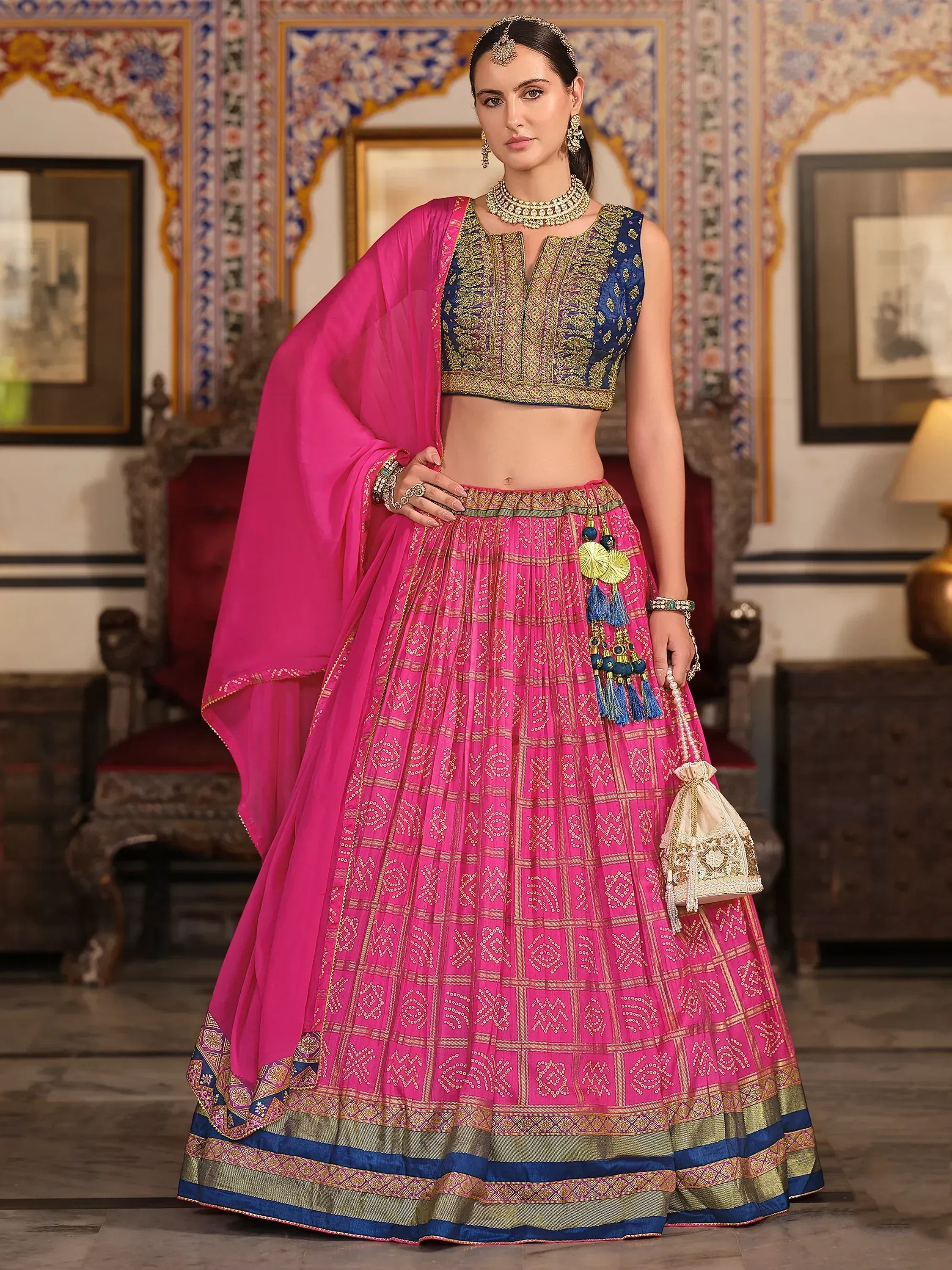 Pink and blue designer lehenga choli with gold embroidery, perfect for Indian ethnic wear occasions
