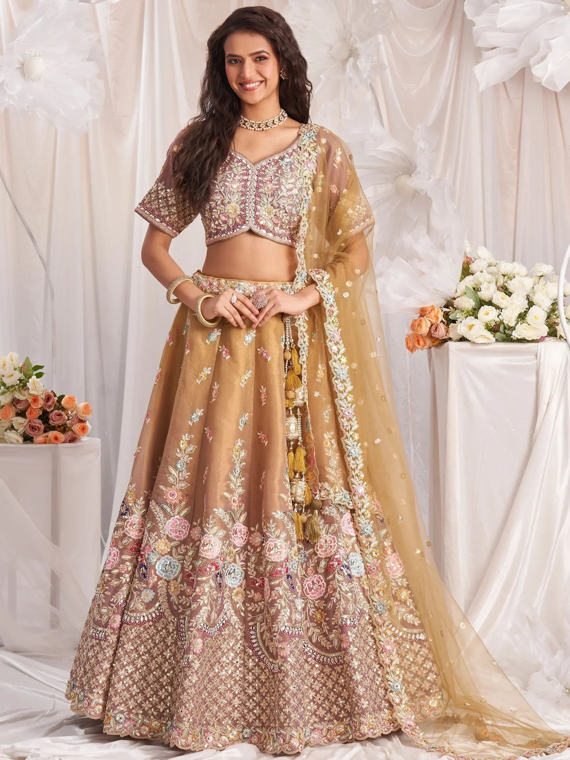 Elegant Indian lehenga choli with floral embroidery, perfect for weddings and festive occasions.