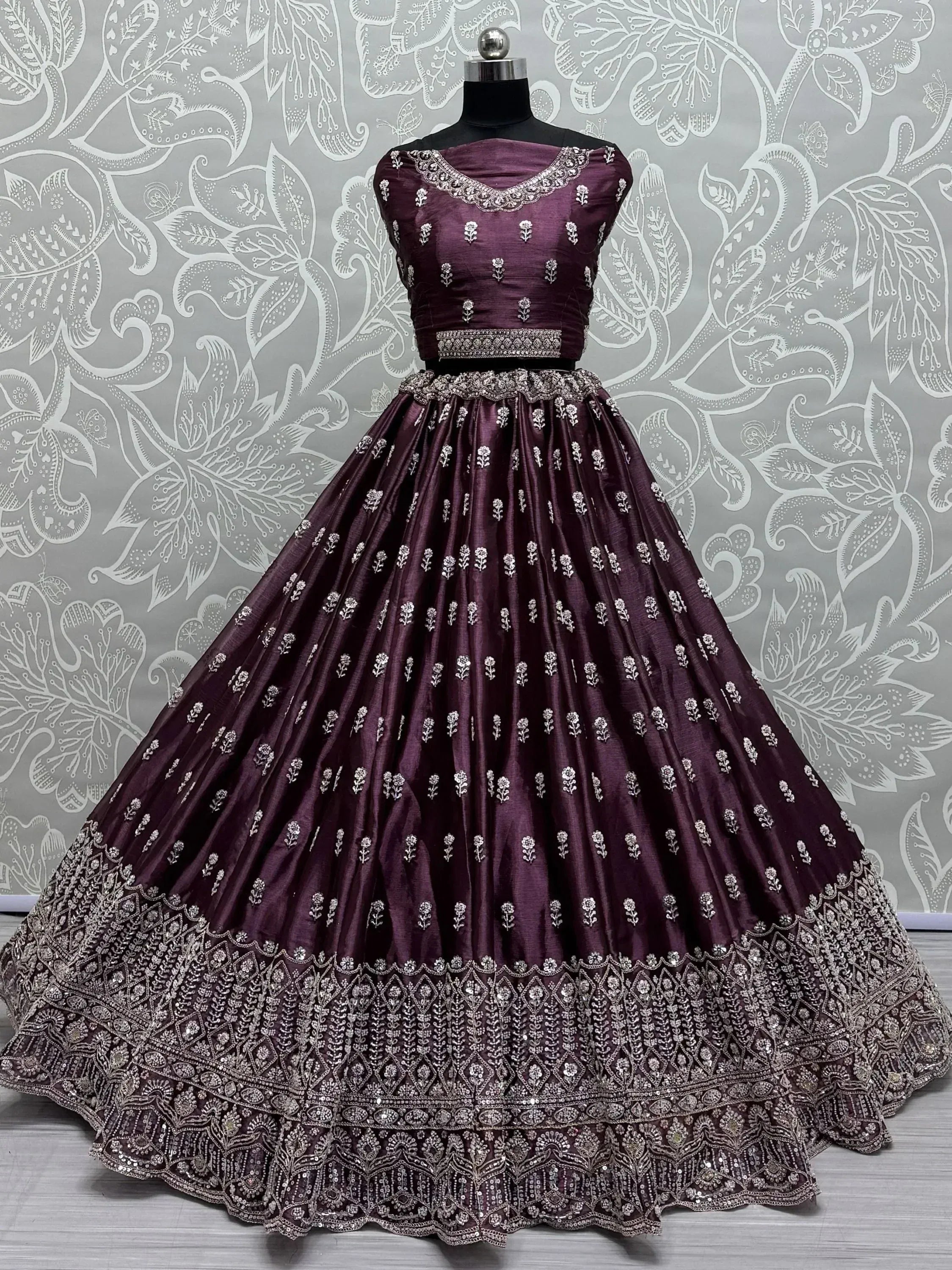 Purple designer lehenga choli with silver embroidery, perfect for Indian weddings and festive occasions