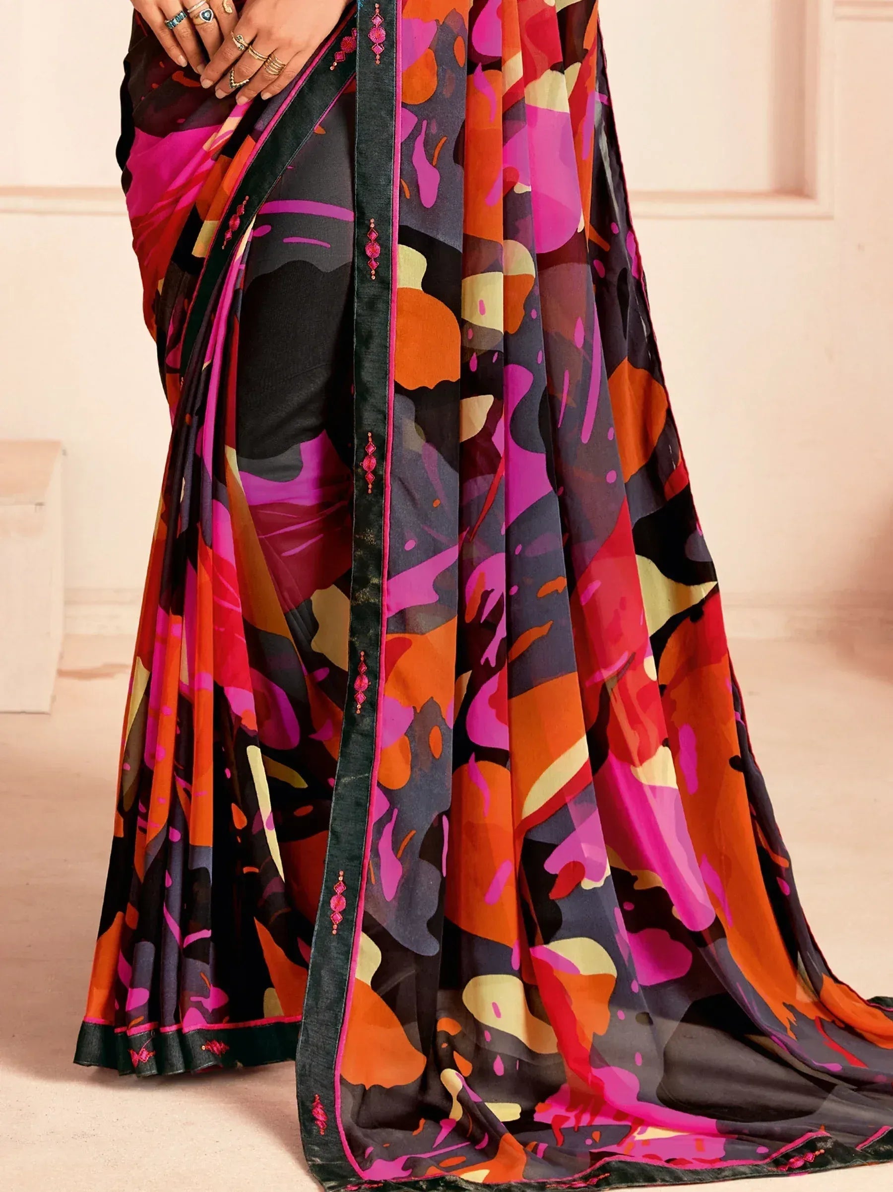 Vibrant abstract print saree with velvet border, perfect for Indian ethnic wear occasions