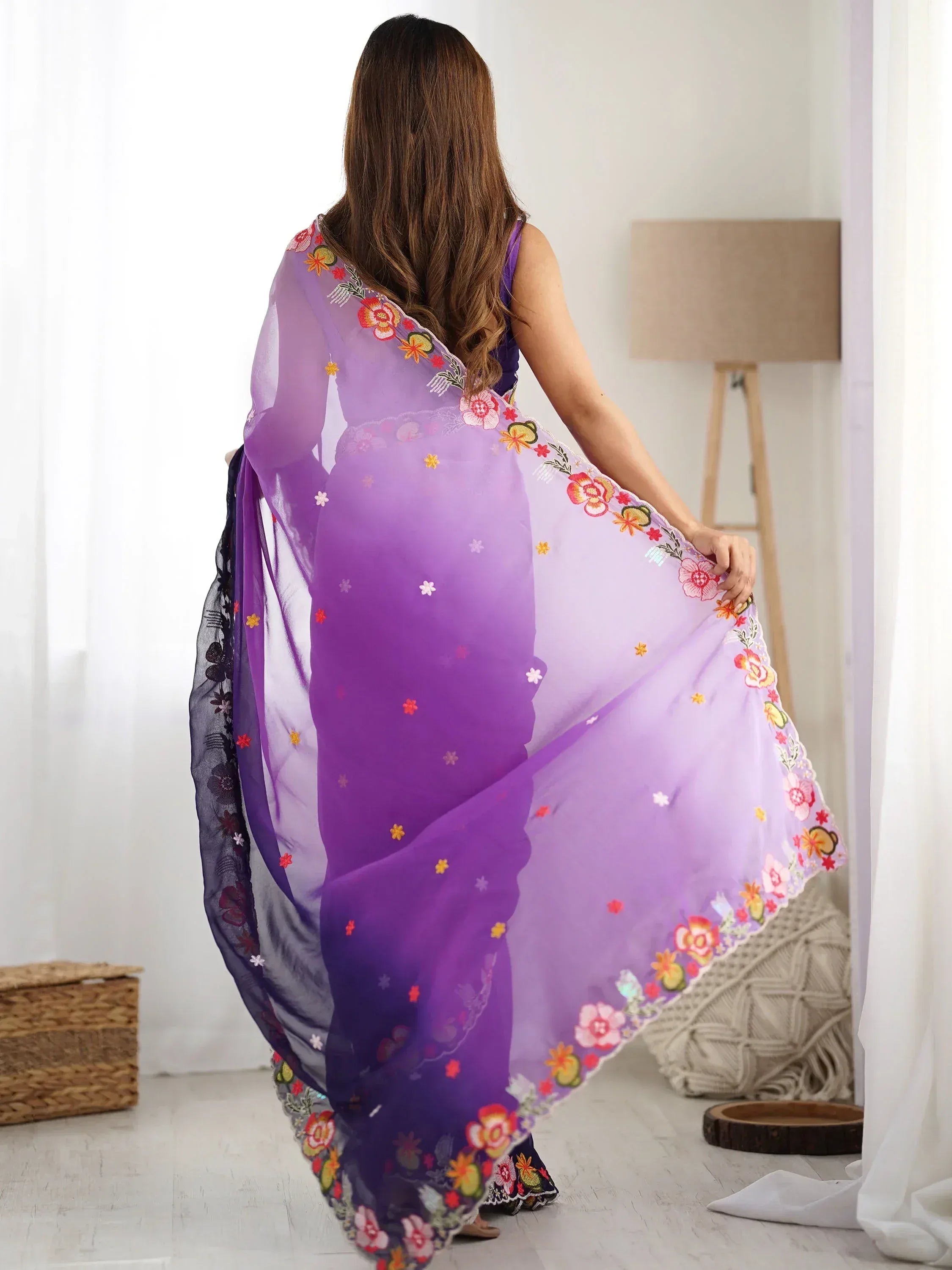 Purple floral embroidered saree with gradient design, perfect for ethnic occasions