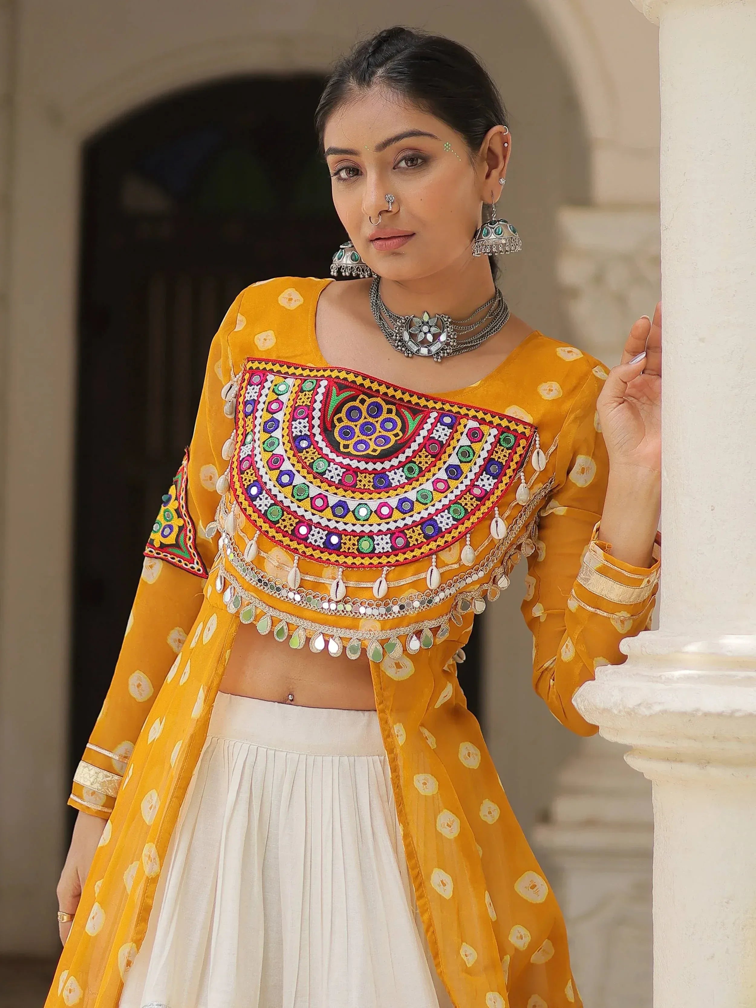 Yellow embroidered ethnic top with mirror work and white skirt, Indian designer wear