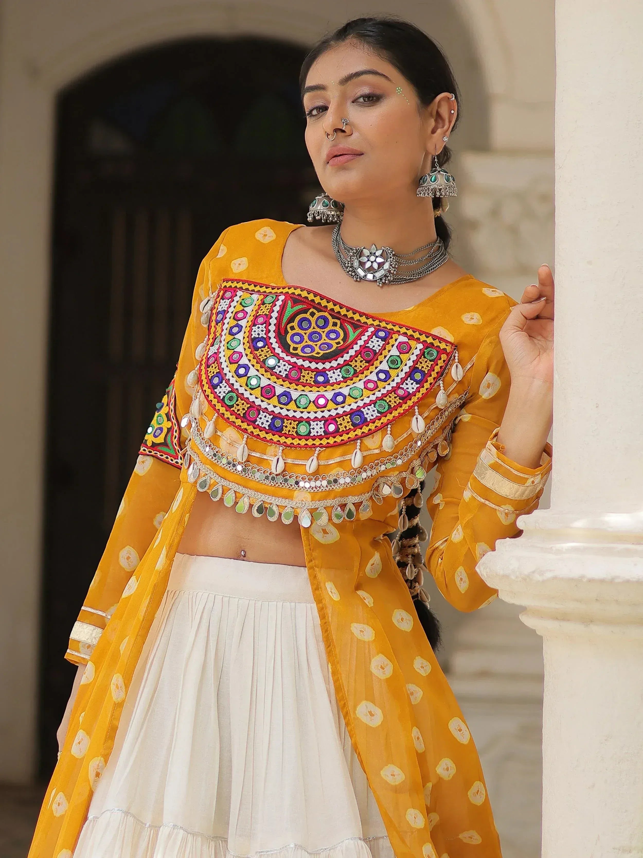 Yellow embroidered crop top with mirror work and white skirt, Indian ethnic wear