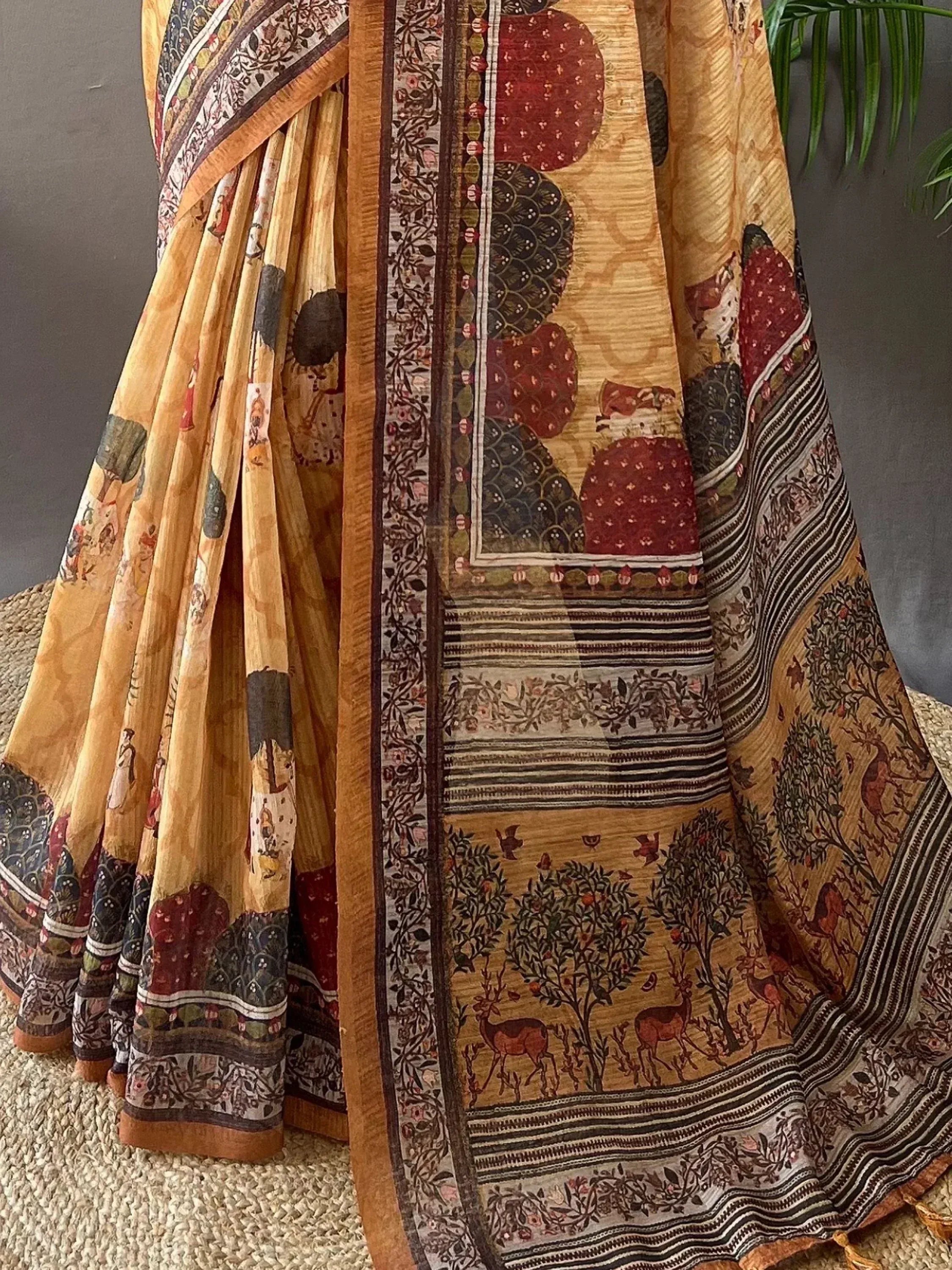 Indian ethnic saree with deer and floral print, mustard base, traditional handloom design