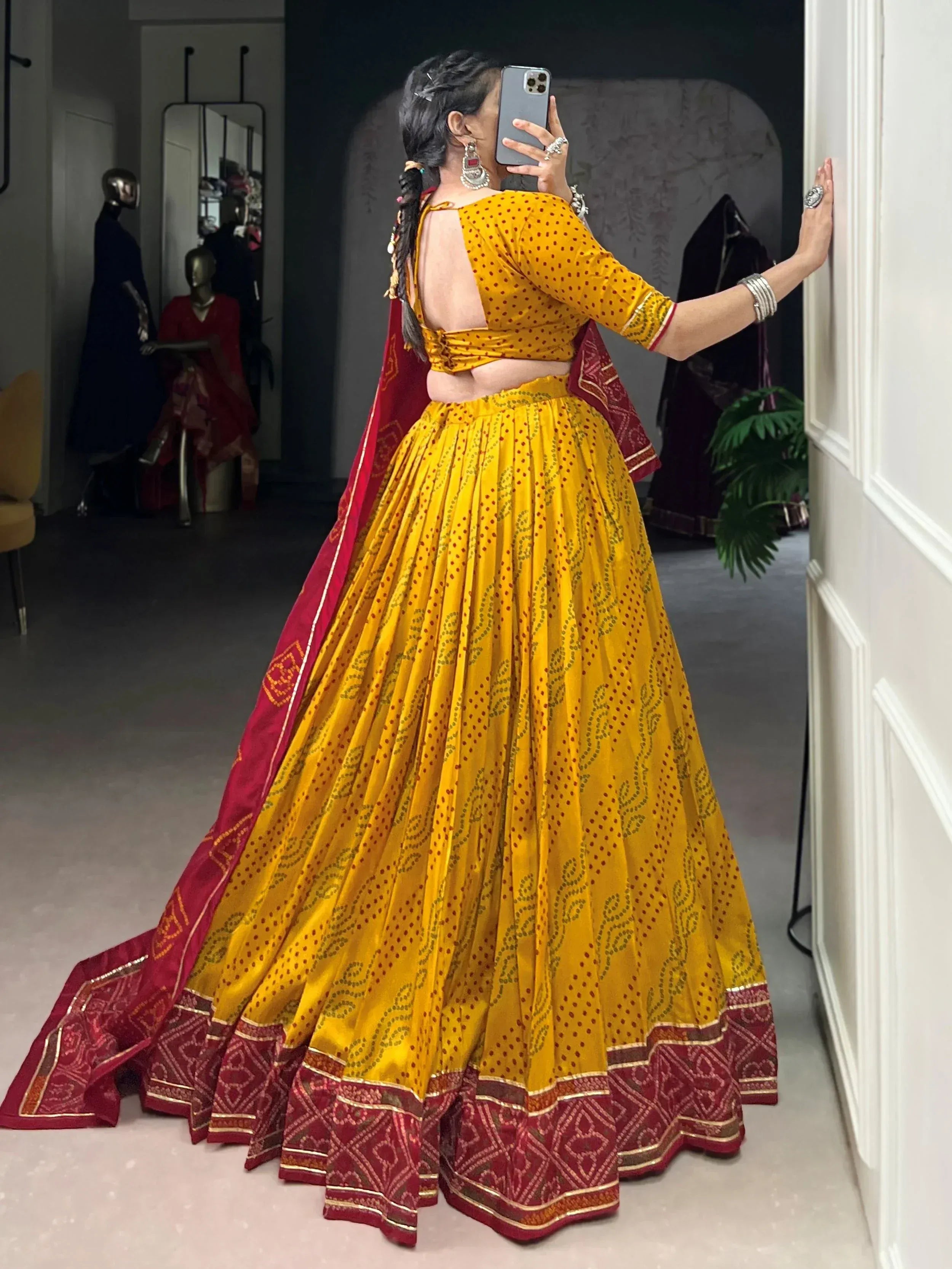 Yellow and red printed lehenga choli with backless blouse, ethnic Indian wear for women