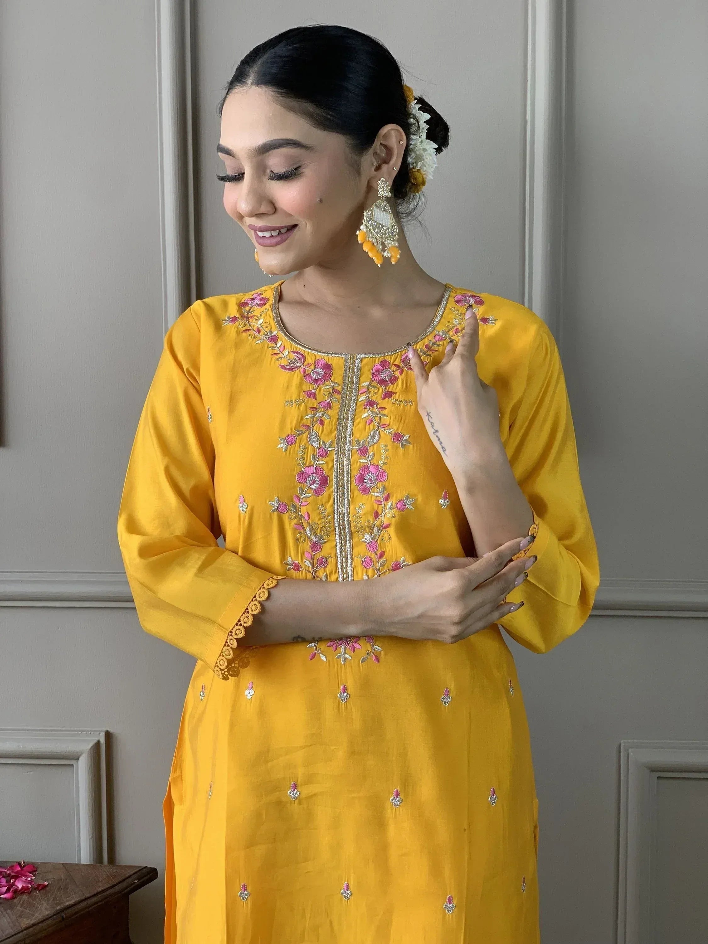 Yellow embroidered kurta with pink floral design, perfect for Indian ethnic wear
