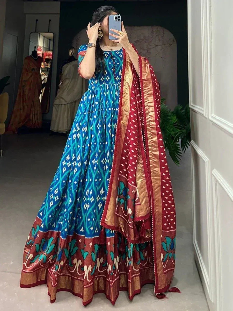 Blue and red ikat print ethnic gown with matching dupatta, perfect for Indian occasions