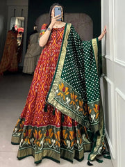 Astonishing Red Patola Printed Silk Festival Wear Gown With Dupatta