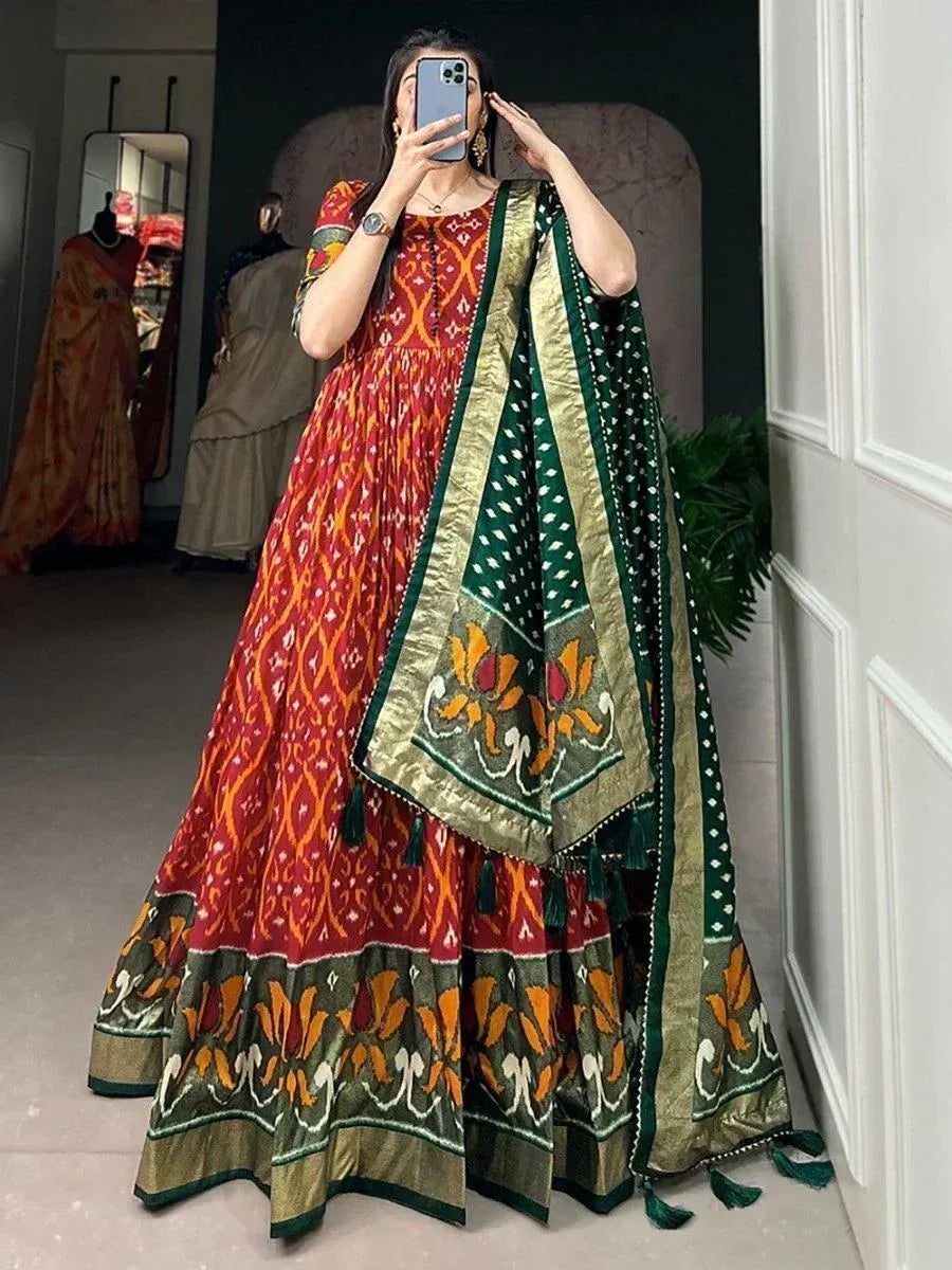 Red and green printed ethnic gown with matching dupatta, perfect for Indian occasions and festivals