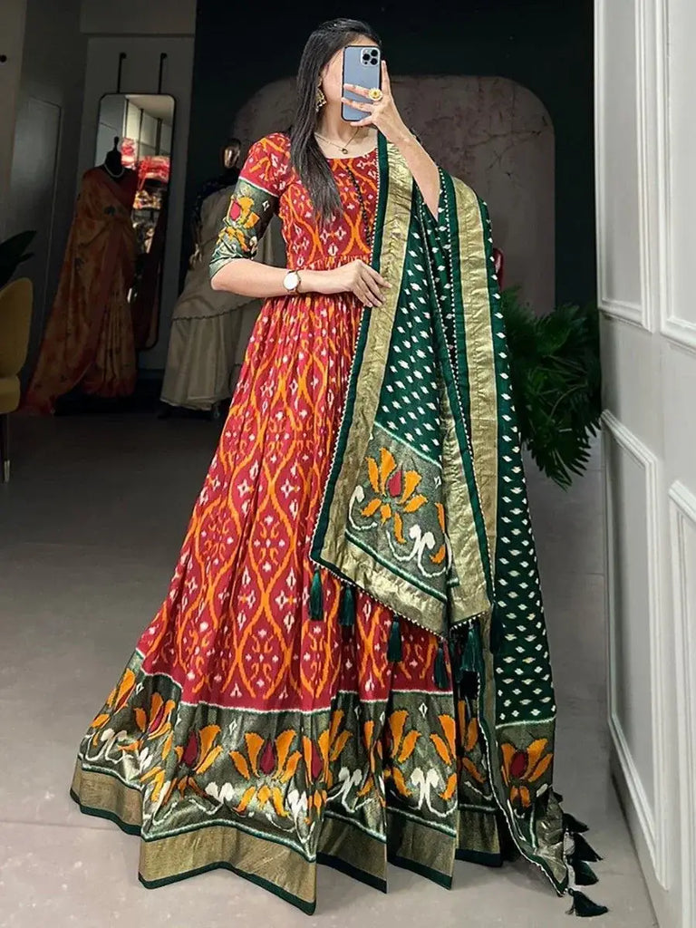 Astonishing Red Patola Printed Silk Festival Wear Gown With Dupatta