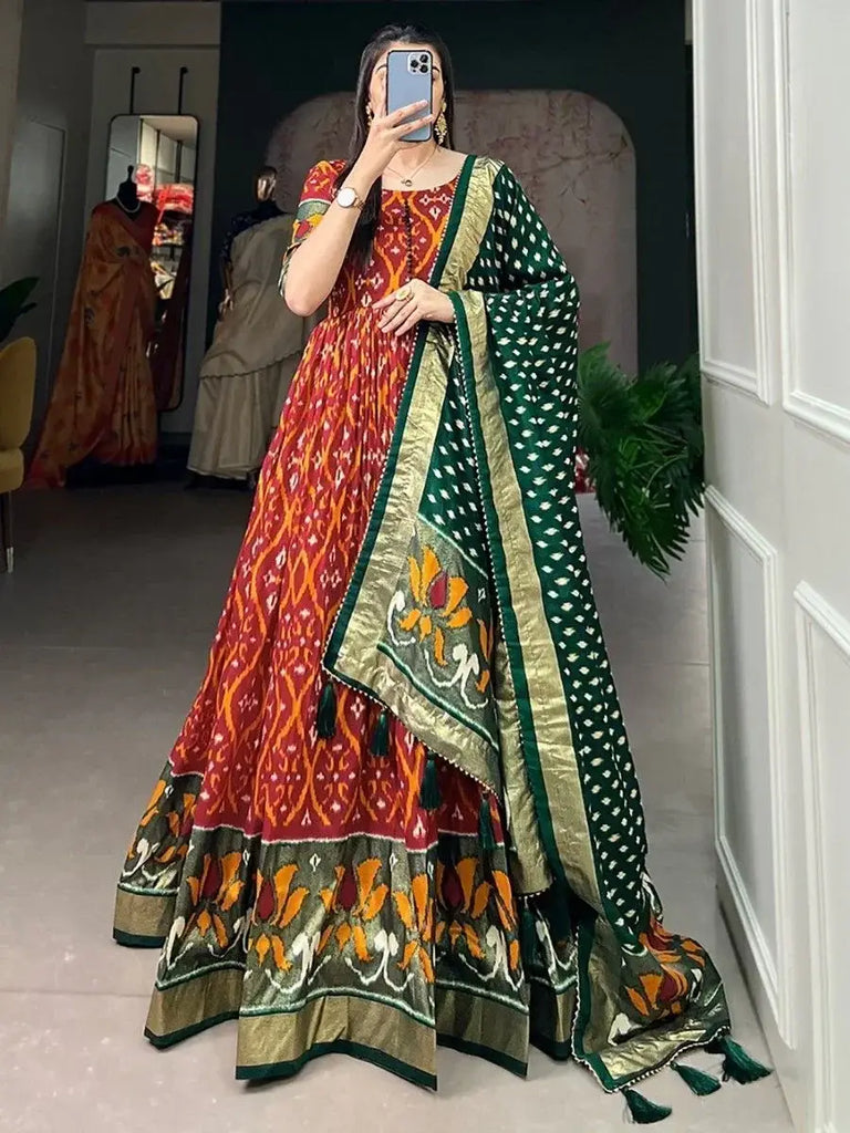 Astonishing Red Patola Printed Silk Festival Wear Gown With Dupatta