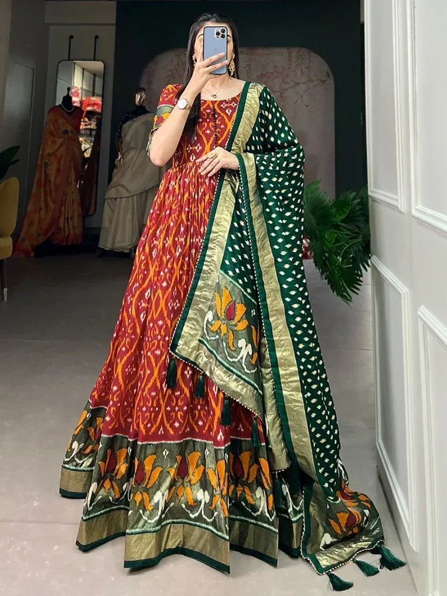 Red and green printed ethnic gown with dupatta, perfect for Indian occasions and festivals