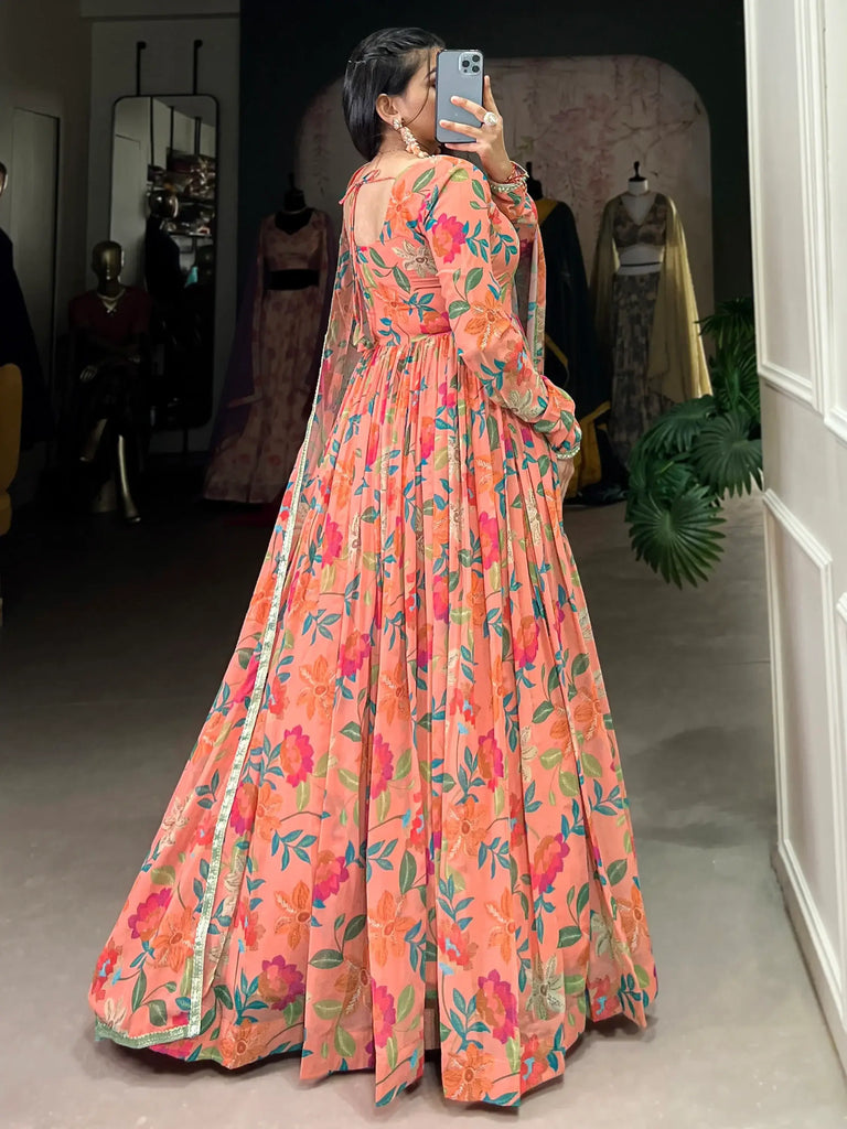 Gorgeous Peach Floral Printed Georgette Festival Wear Gown