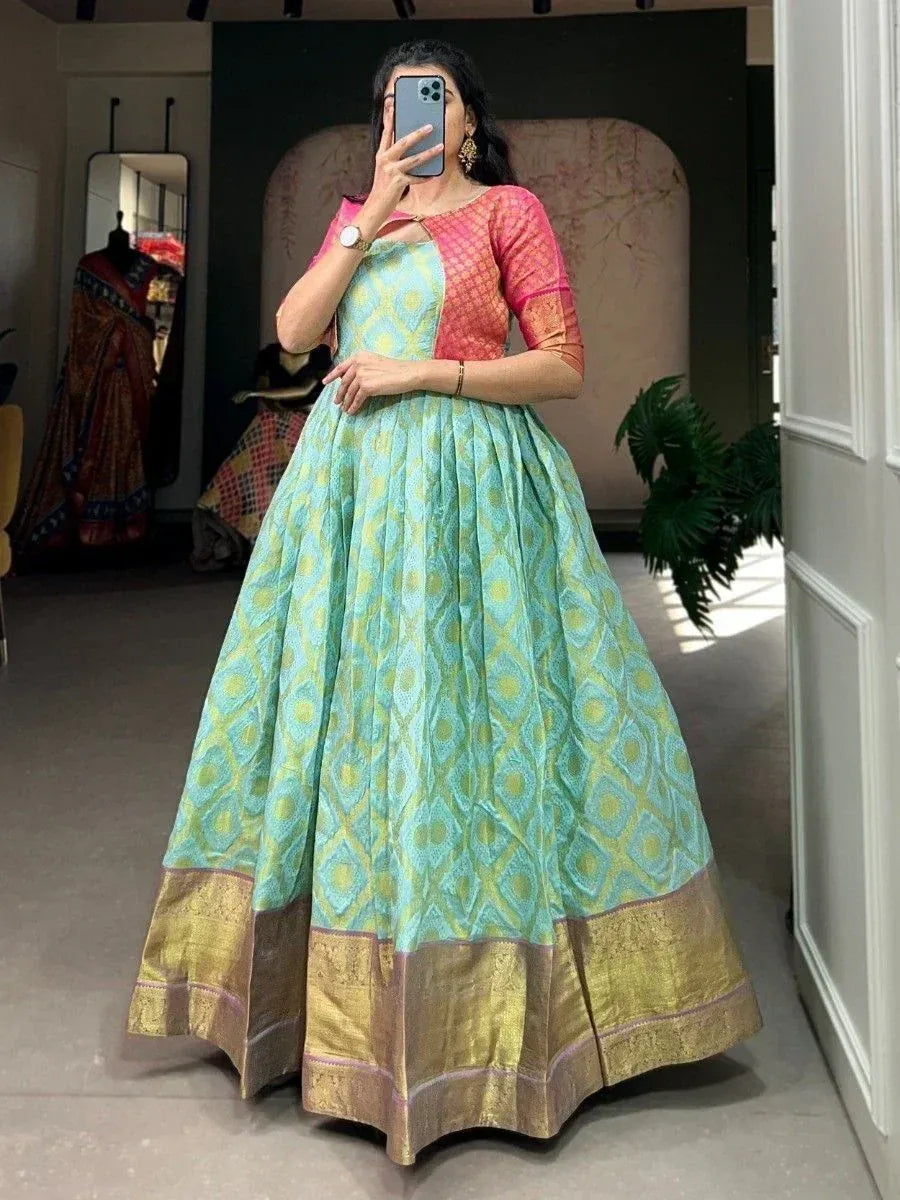 Woman in mint green printed lehenga with pink blouse, ethnic wear for weddings and festivals