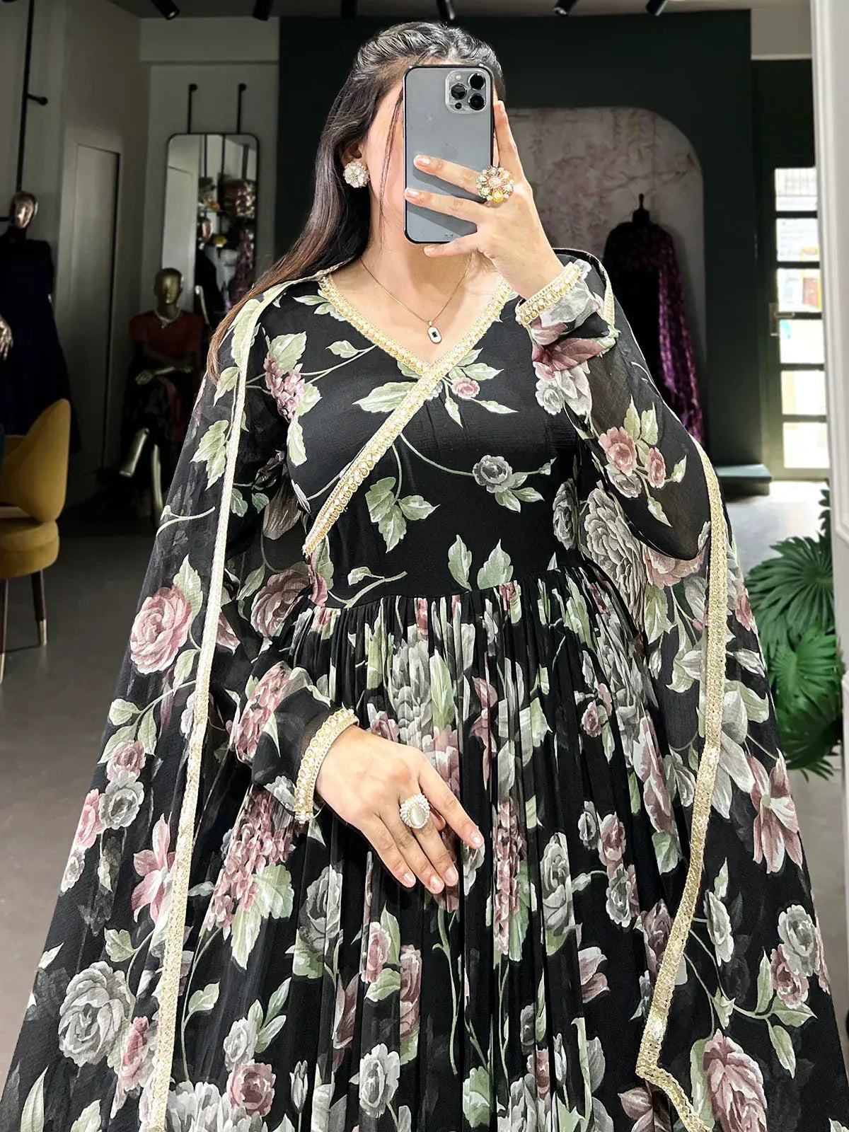 Black floral ethnic gown with gold trim, perfect for Indian occasions and festive wear