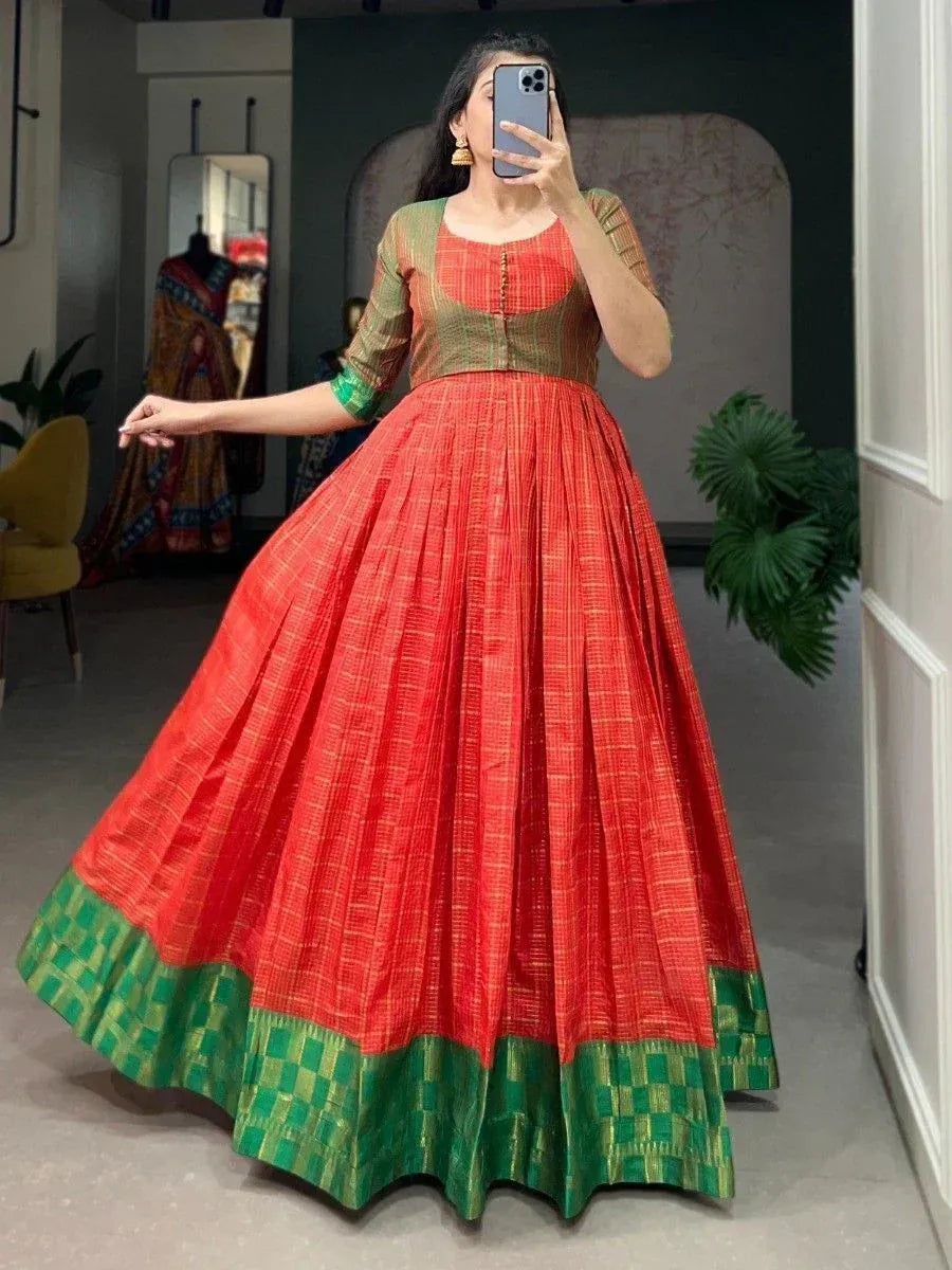 Red and green ethnic gown with pleated skirt, perfect for Indian festive occasions and weddings