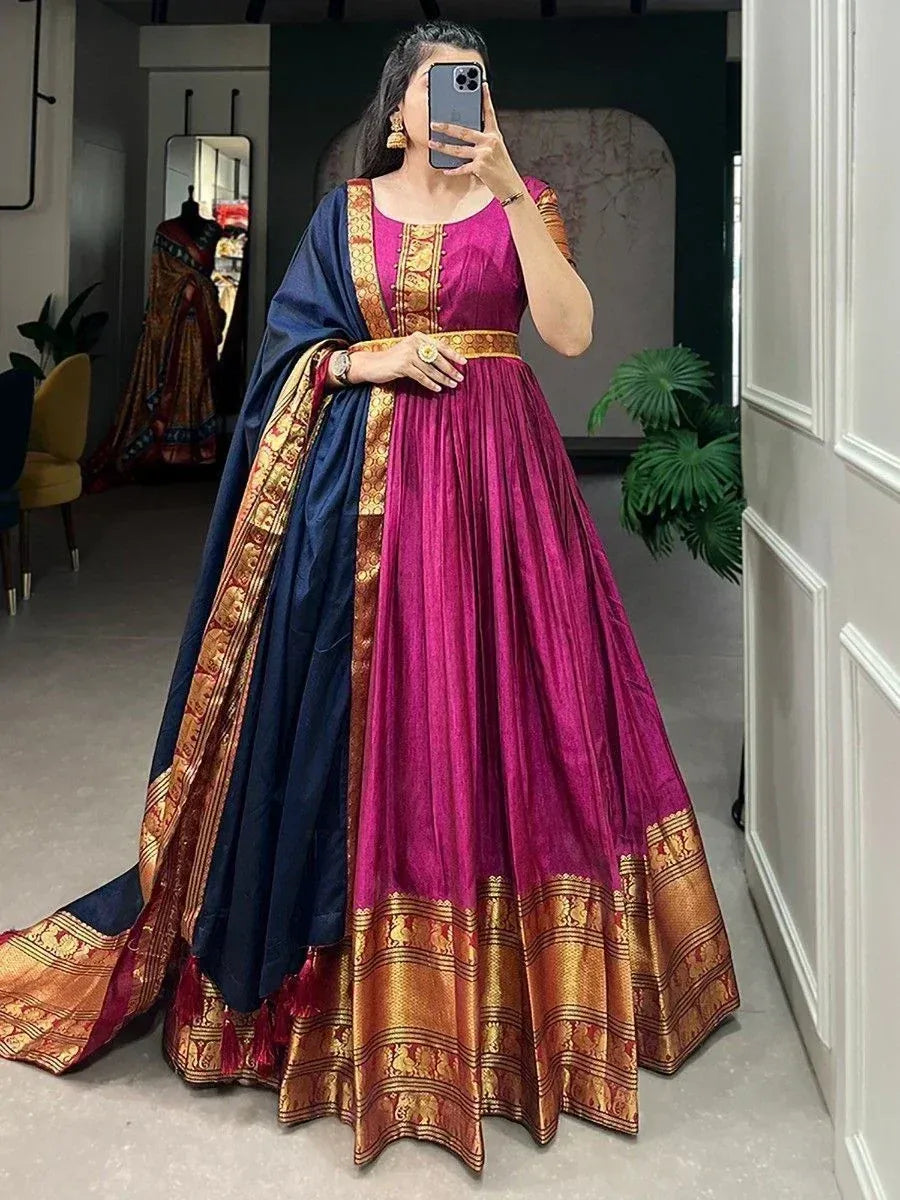 Purple and navy blue ethnic gown with gold embroidery, perfect for Indian weddings and festive occasions.