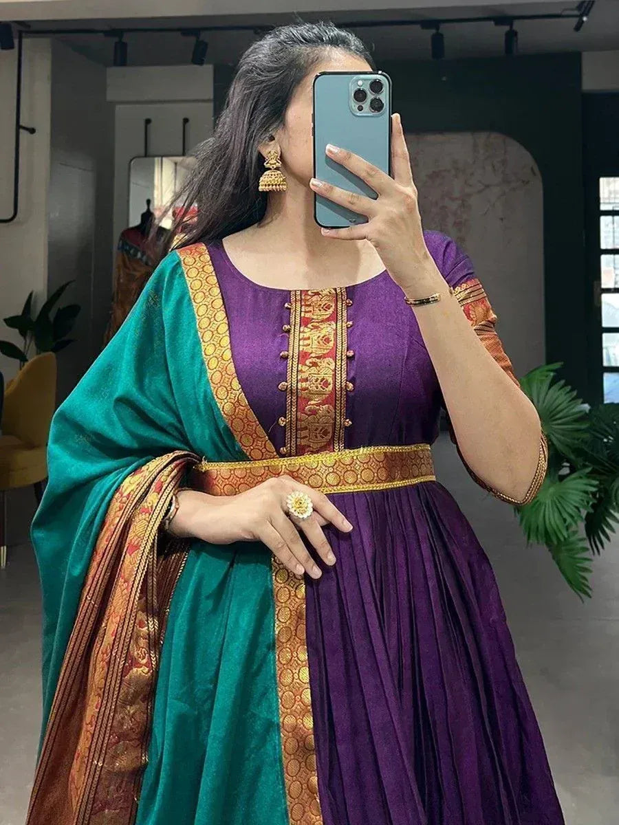 Purple and green ethnic gown with gold embroidery, perfect for Indian festive occasions