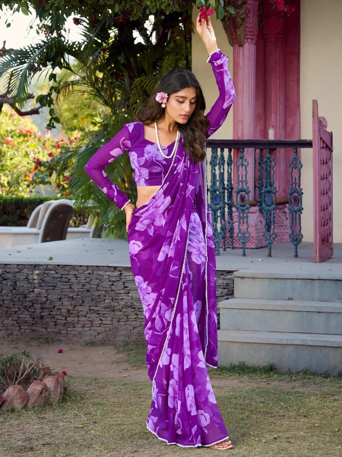 Purple floral saree with matching blouse, perfect for ethnic occasions and traditional events.