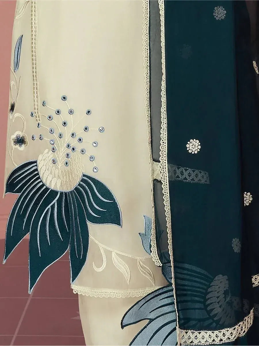 Cream and dark blue ethnic wear with floral embroidery and lace border detail