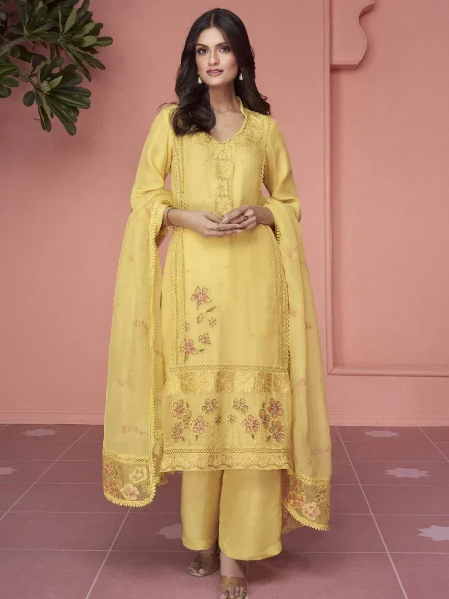 Yellow embroidered salwar kameez with floral dupatta, ethnic Indian wear for women