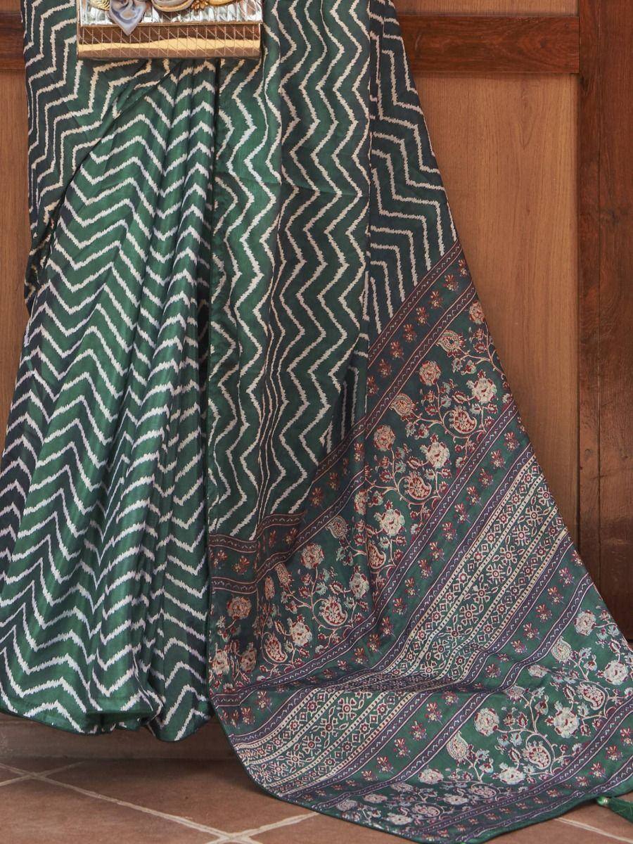 Green ikat zigzag and floral border saree, ethnic Indian wear with traditional print design