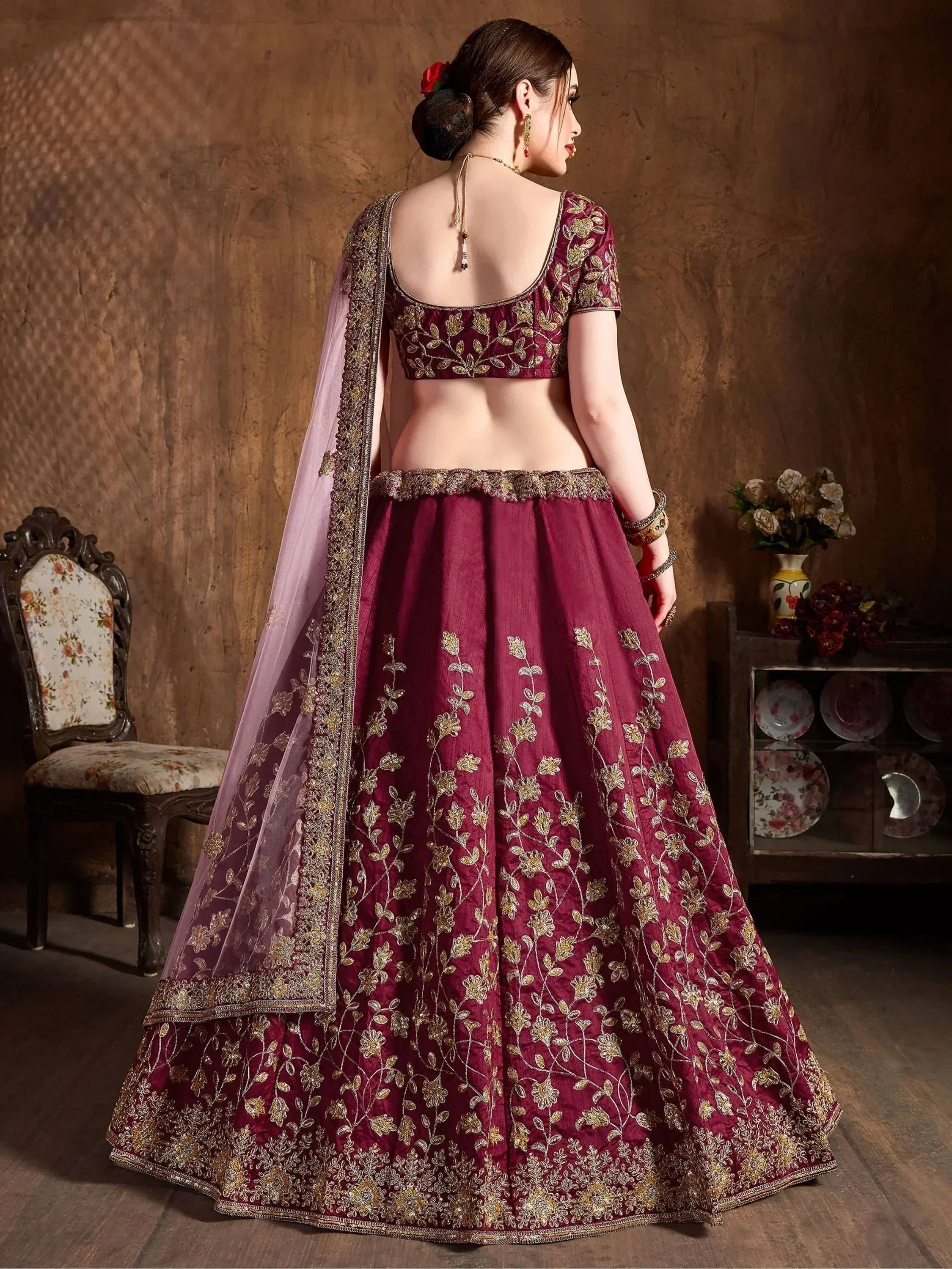 Maroon embroidered lehenga choli with gold floral work and sheer dupatta, Indian ethnic wear