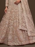 Ravishing Beige Embroidered Soft Net Ceremony Wear Lehenga Choli