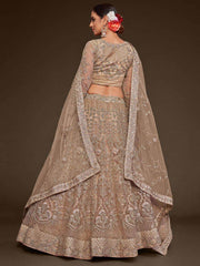 Gorgeous Beige Embroidered Soft Net Occasion Wear Lehenga Choli
