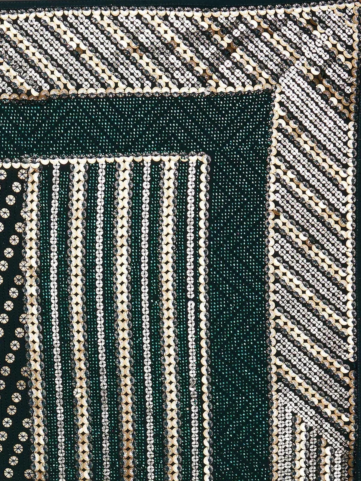 Emerald green ethnic wear with intricate white and gold sequin patterns, perfect for festive occasions.