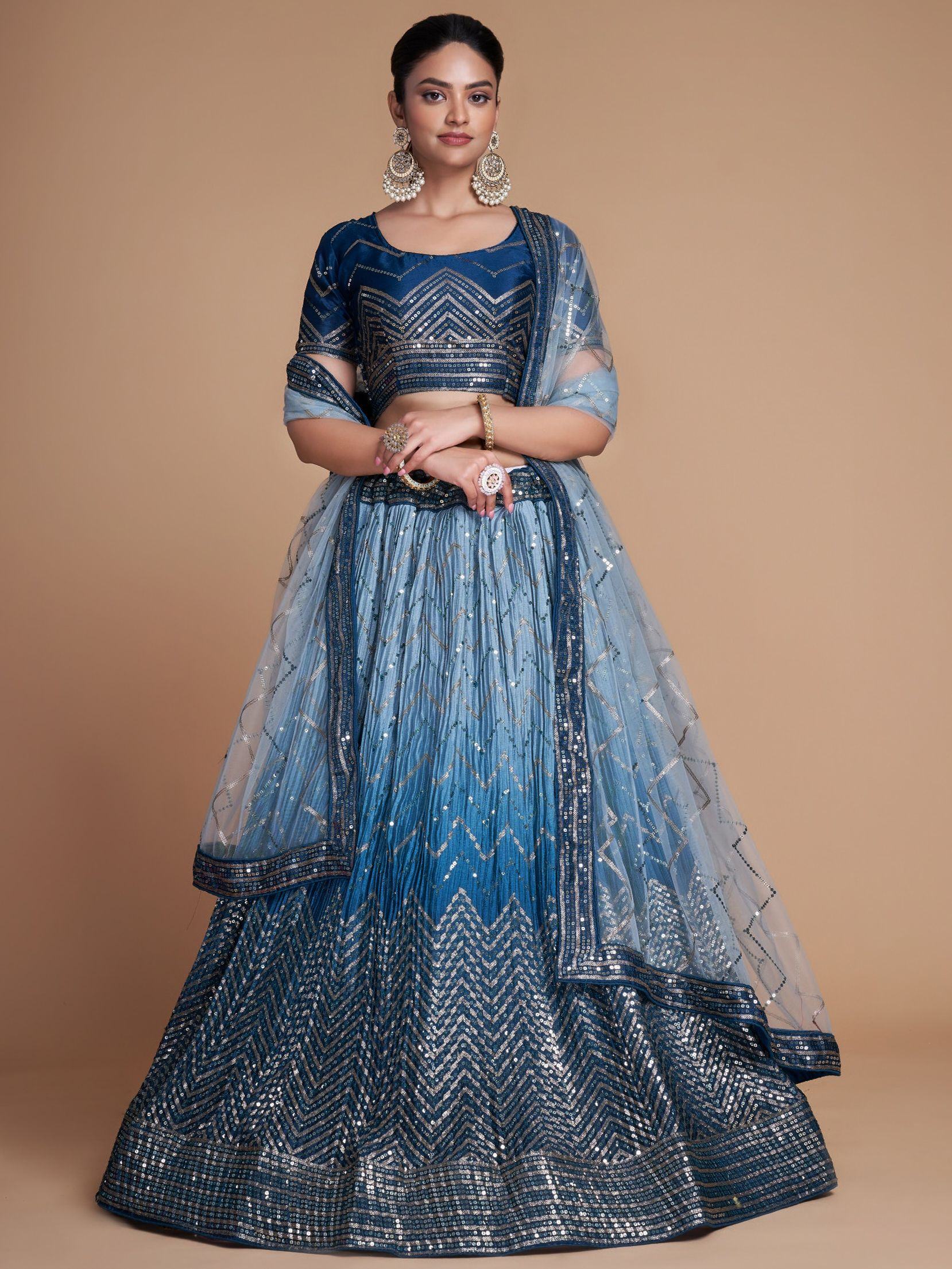 Blue designer lehenga choli with sequin chevron patterns, perfect for Indian ethnic wear events