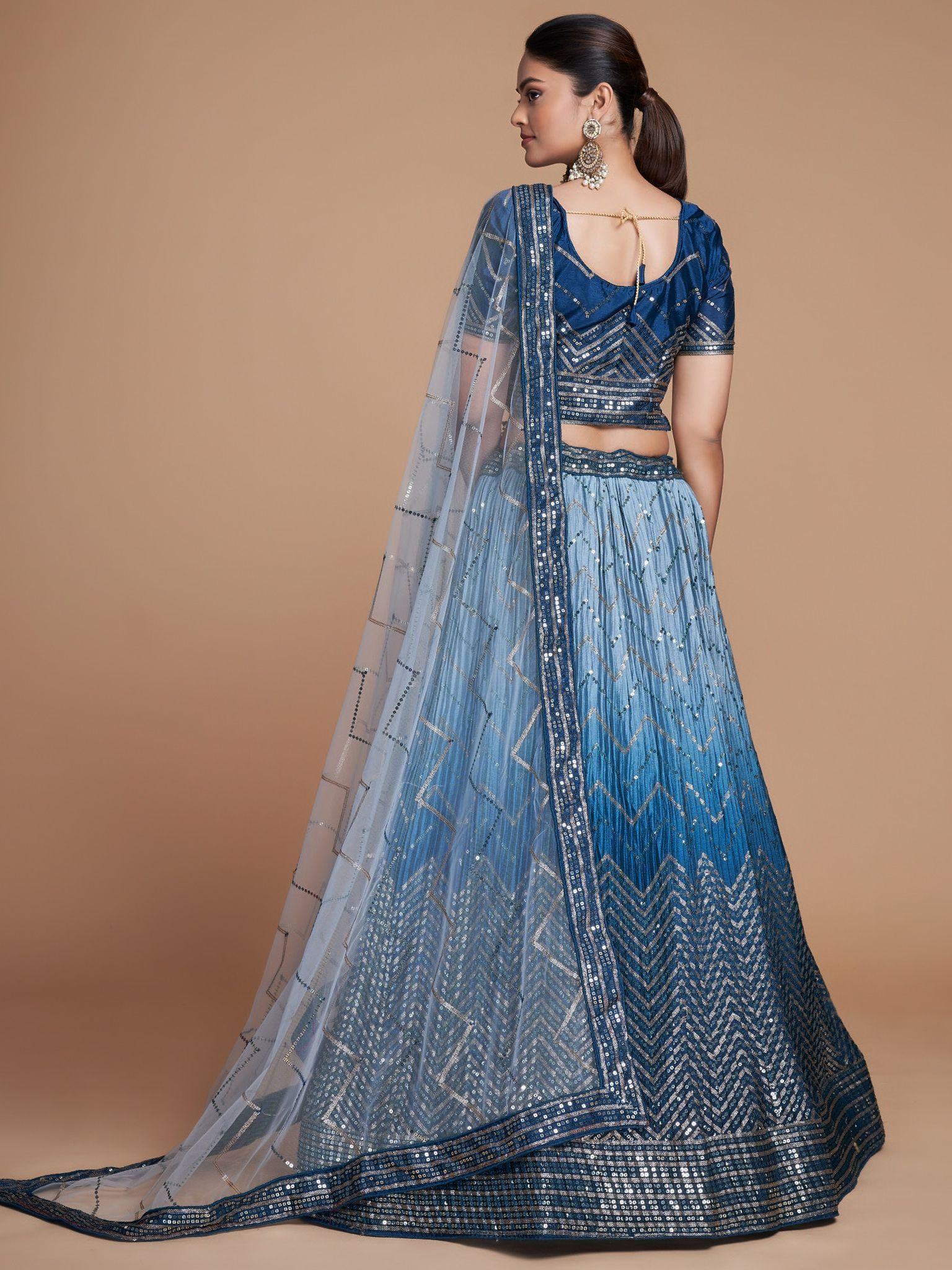 Blue ombre lehenga choli with sequin chevron patterns and sheer dupatta, ethnic Indian wear