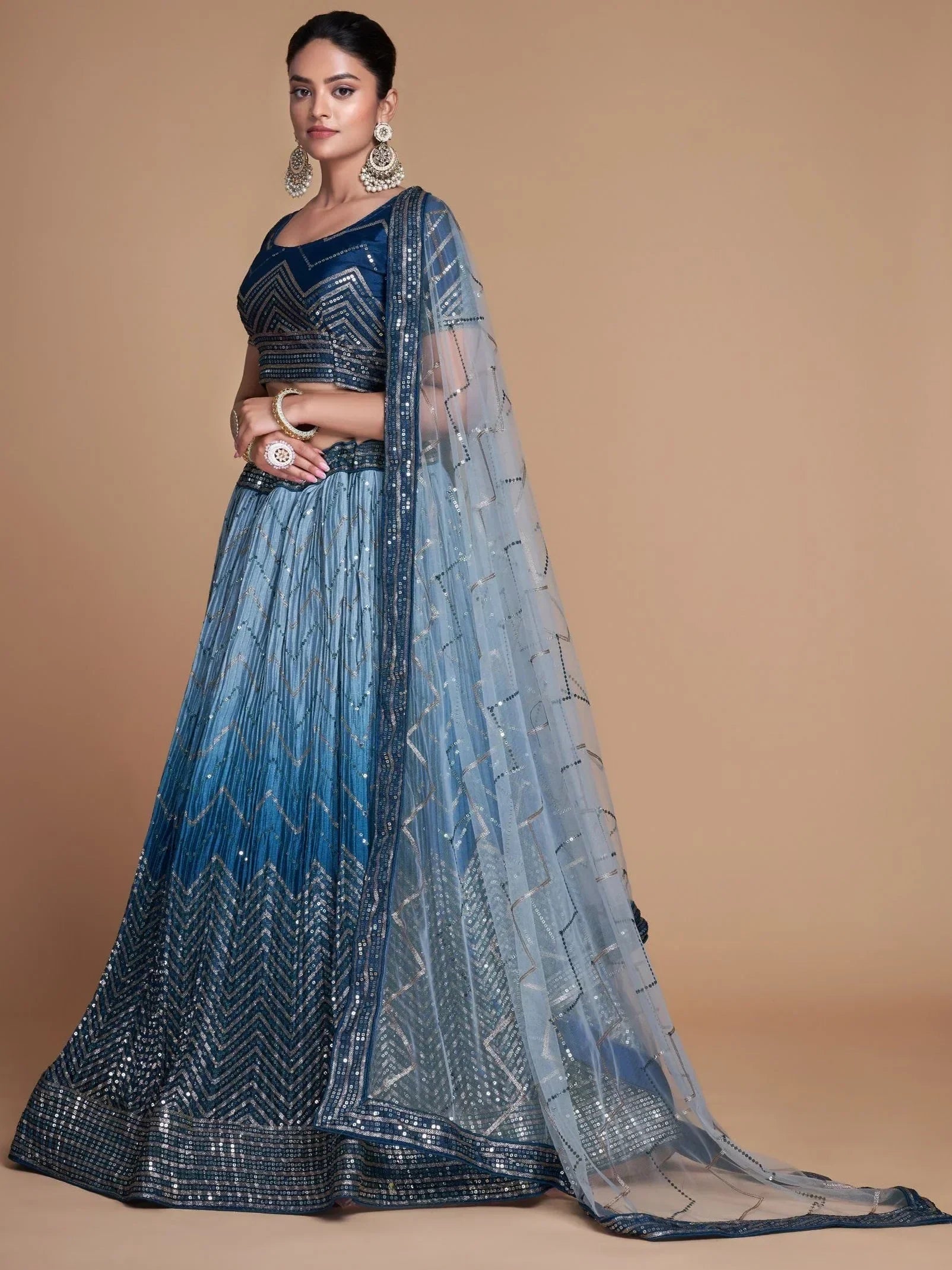 Blue sequin lehenga choli with geometric embroidery and sheer dupatta, Indian ethnic wear