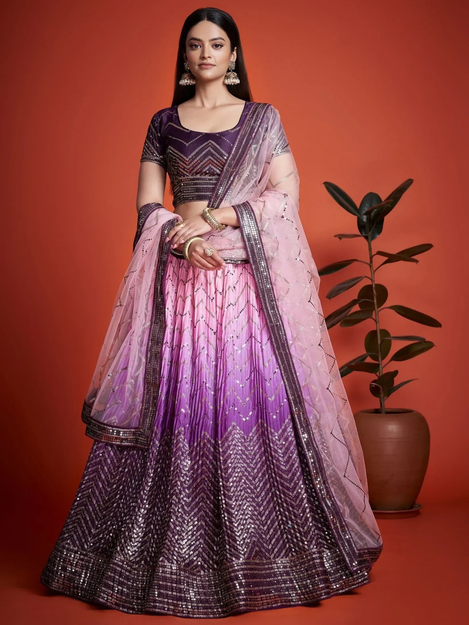 Purple and pink ombre lehenga choli with sequin chevron patterns, perfect for Indian ethnic wear events.
