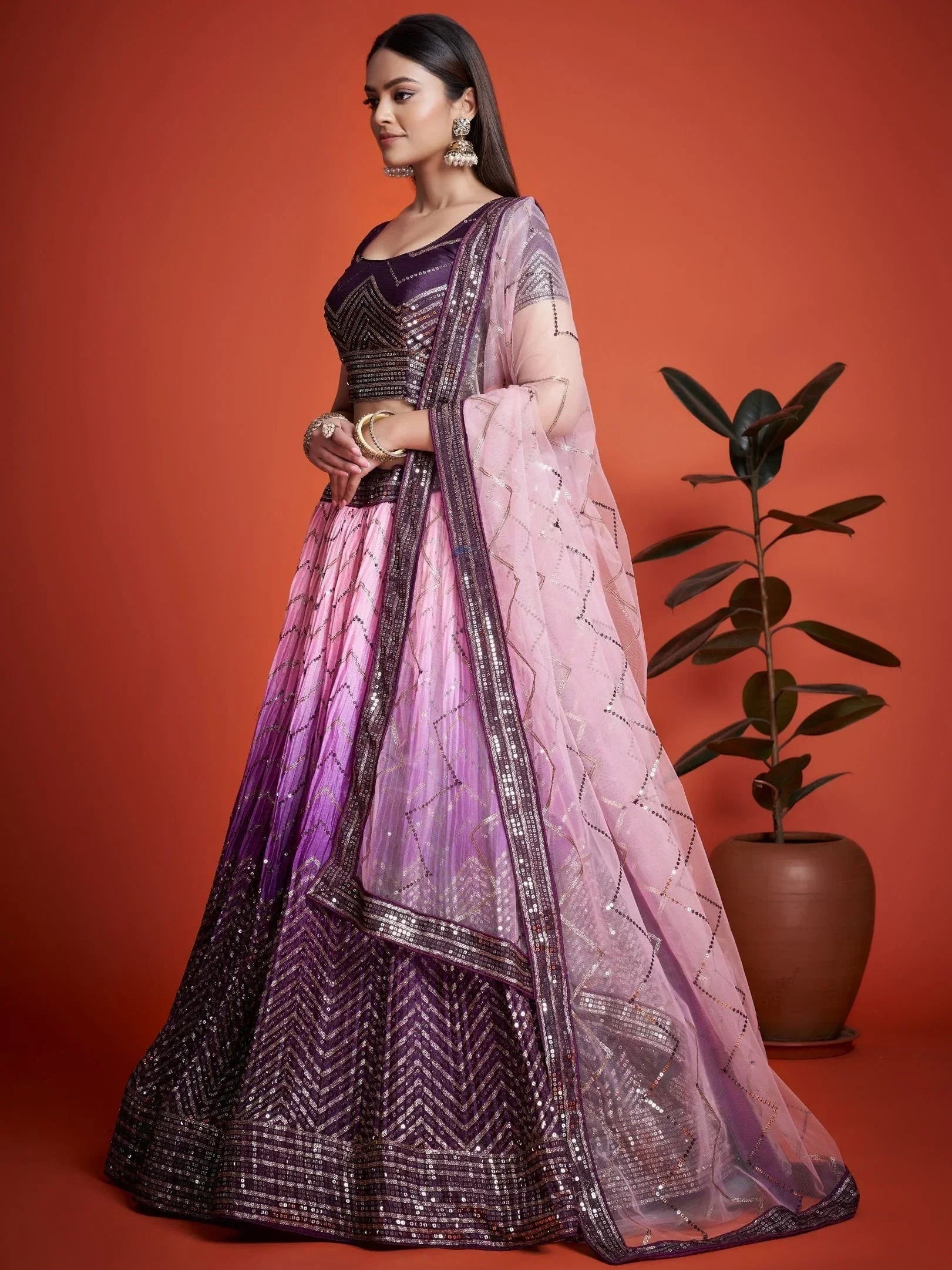 Purple and pink ombre lehenga choli with sequin embroidery, perfect for Indian weddings and festive occasions.
