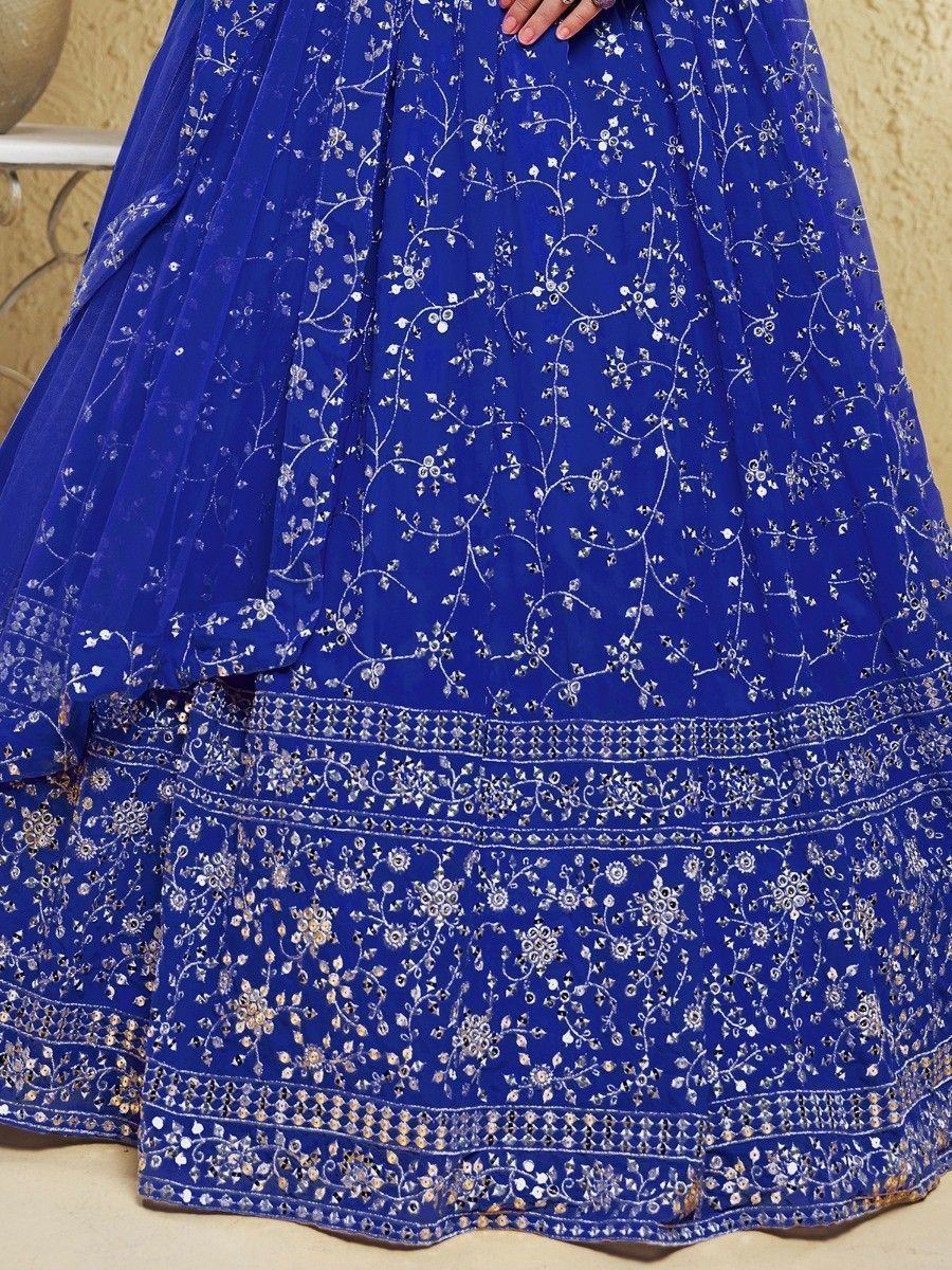 Royal blue embroidered lehenga skirt with silver floral motifs and detailed border work