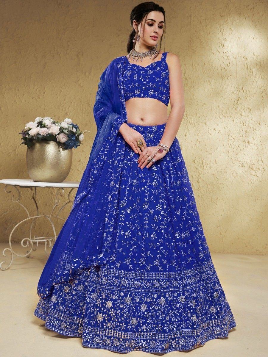 Royal blue embroidered lehenga choli with floral motifs, perfect for Indian ethnic wear and festive occasions.