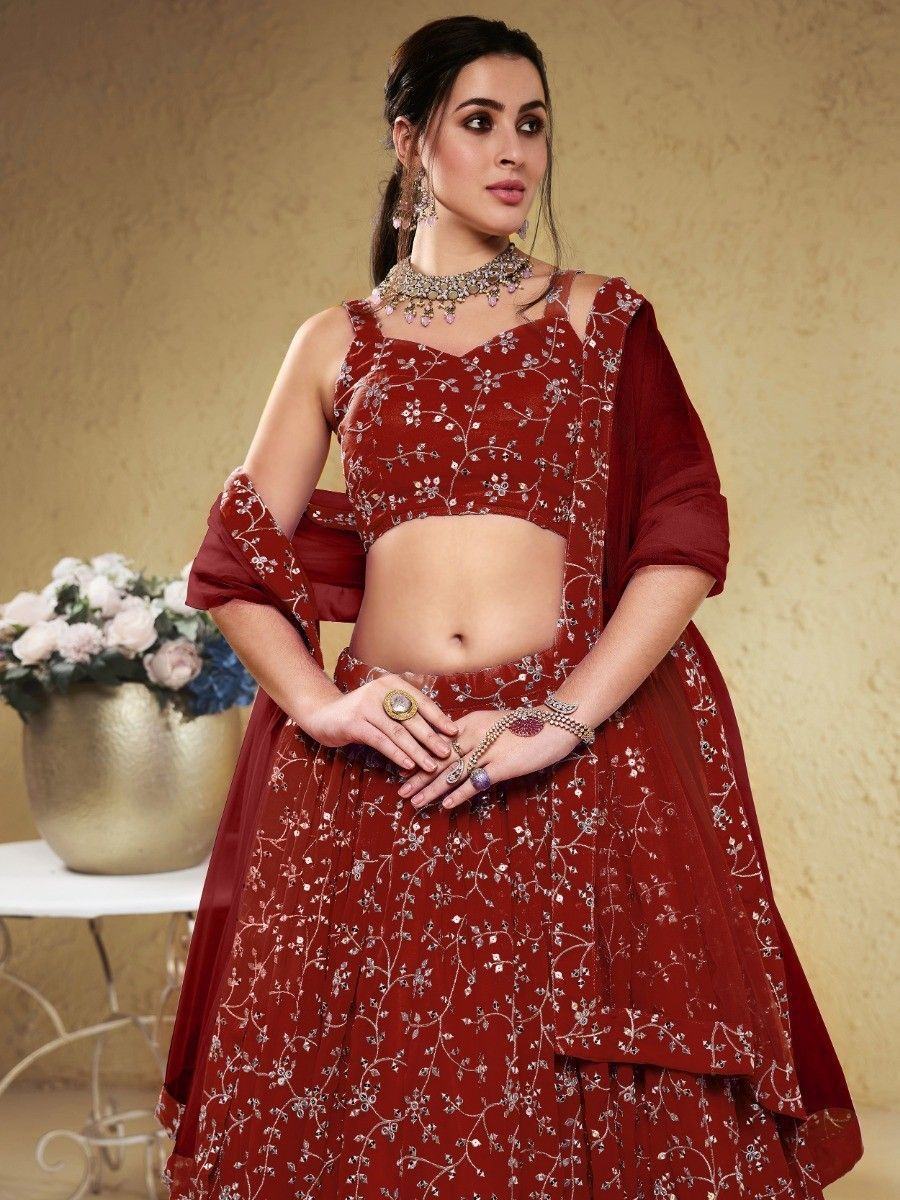 Maroon embroidered lehenga choli with floral thread work, perfect for Indian weddings and festive occasions