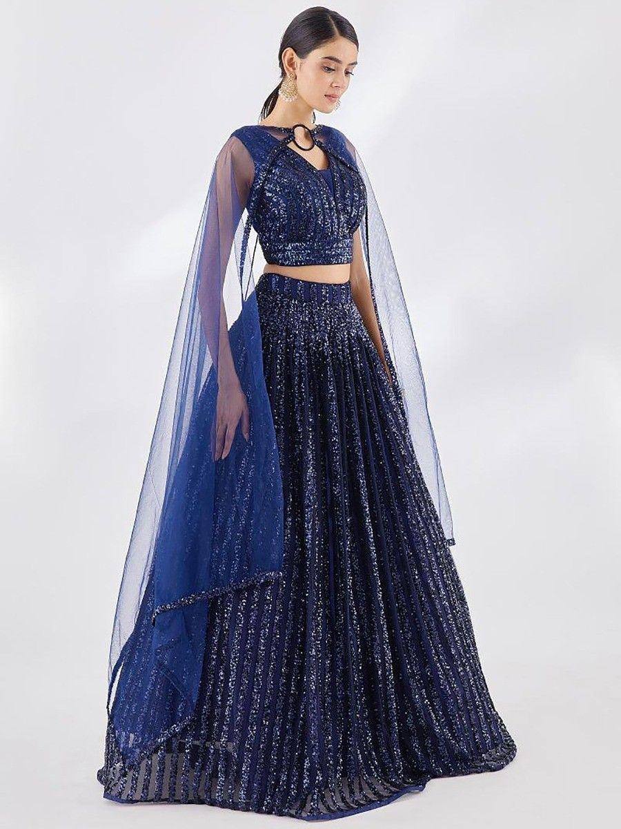 Navy blue sequined lehenga choli with sheer cape, perfect for Indian ethnic occasions
