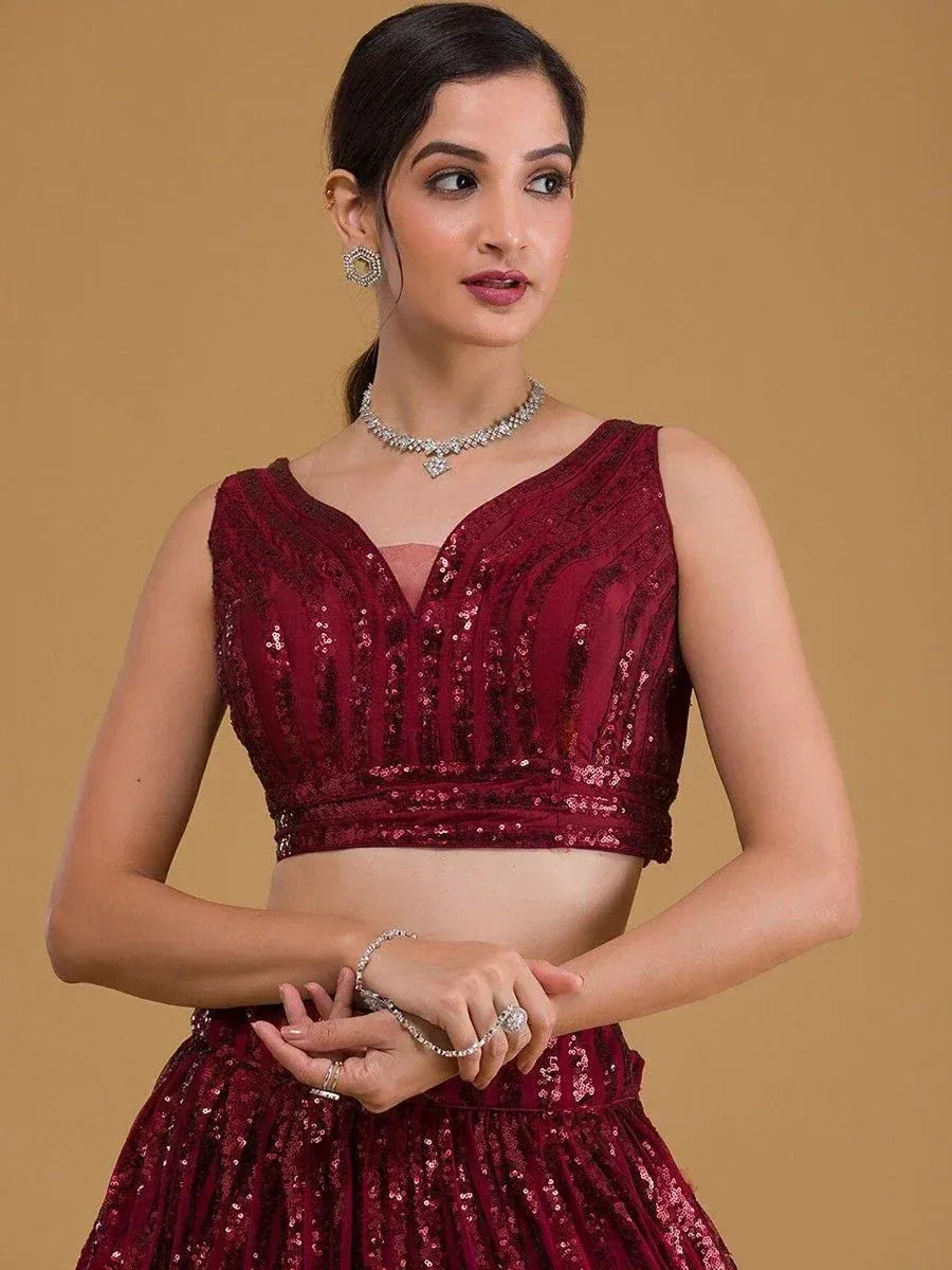 Maroon sequin lehenga choli with V-neck blouse, perfect for Indian ethnic wear occasions