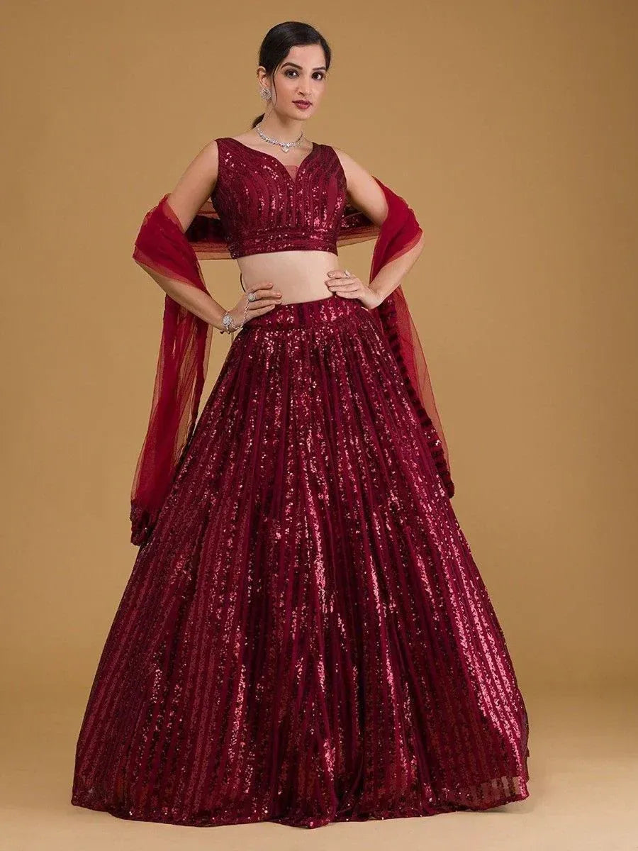 Burgundy sequin lehenga choli with sheer dupatta, perfect for Indian weddings and festive occasions