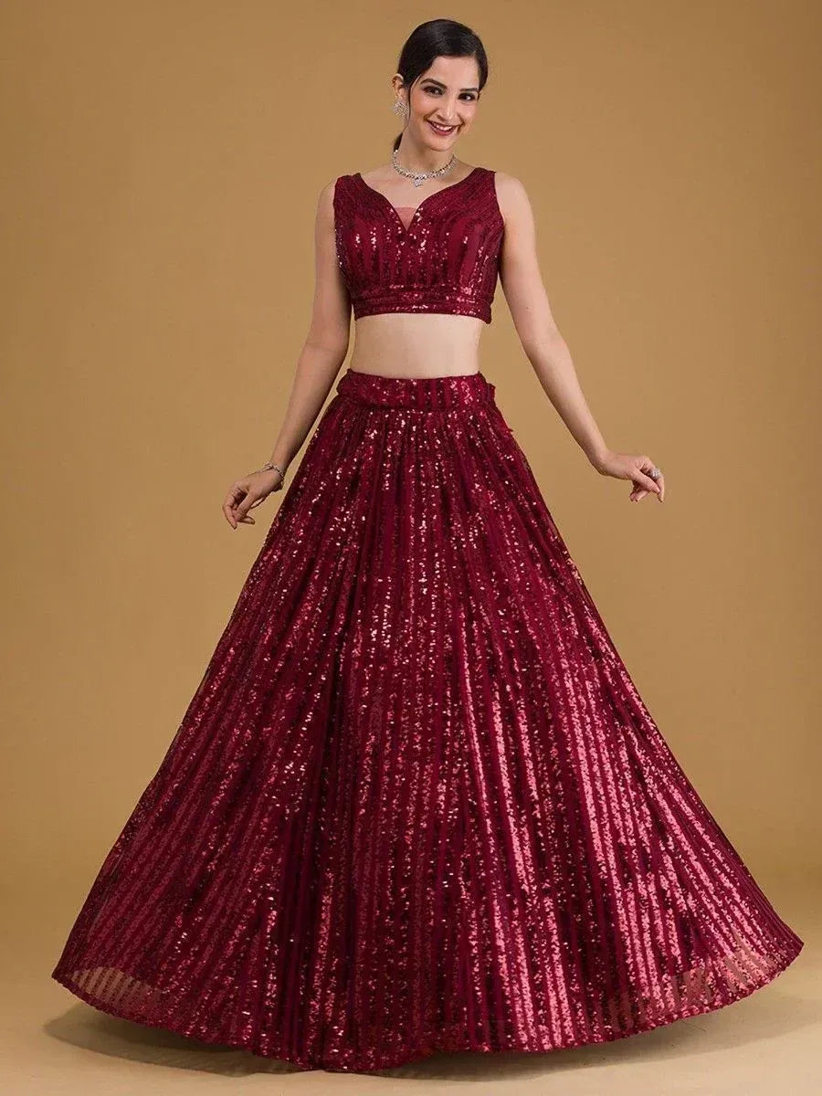 Burgundy sequin lehenga choli with V-neck blouse, perfect for Indian weddings and festive occasions