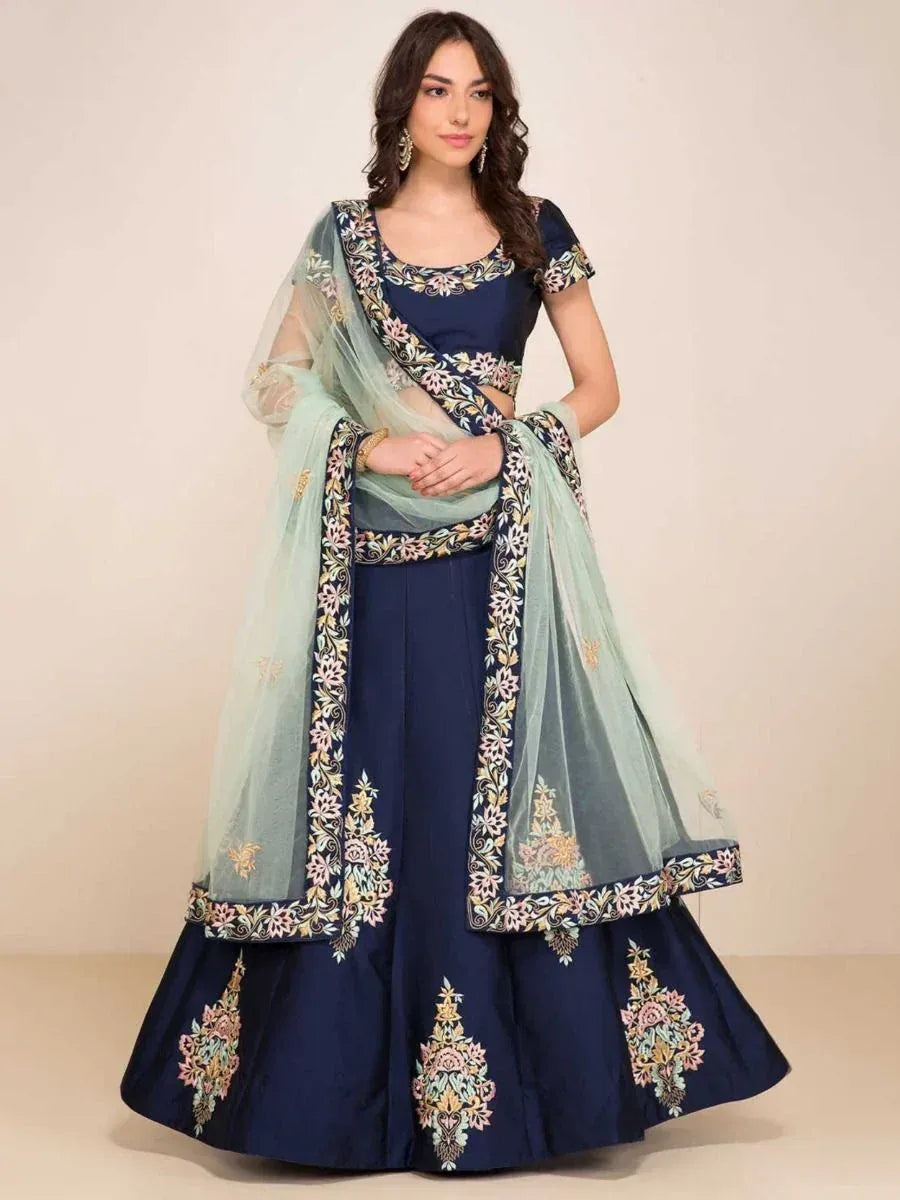 Navy blue embroidered lehenga choli with mint green dupatta, floral motifs, perfect for weddings and festive occasions