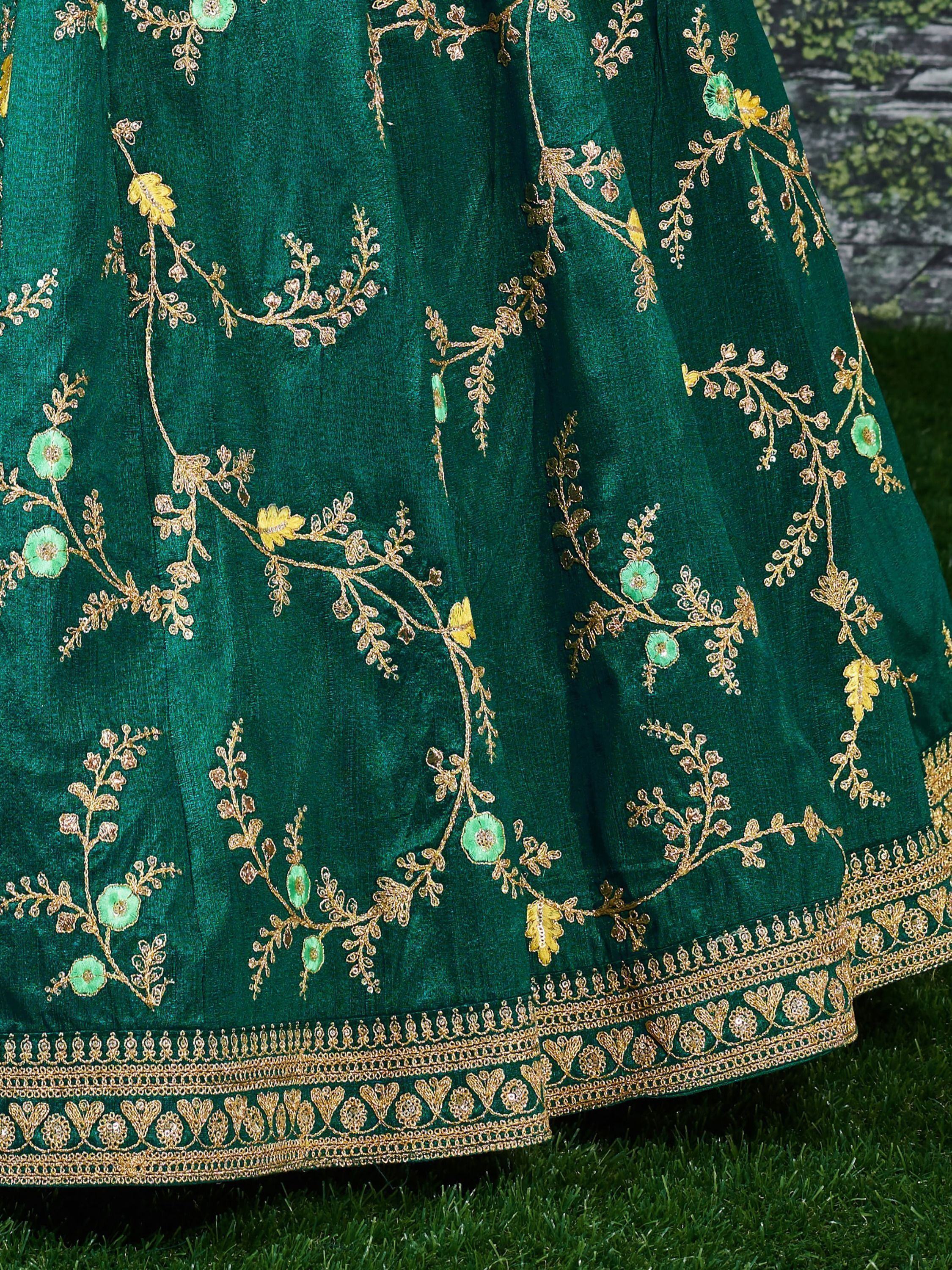 Emerald green lehenga with gold floral embroidery and intricate border, ideal for Indian ethnic wear.