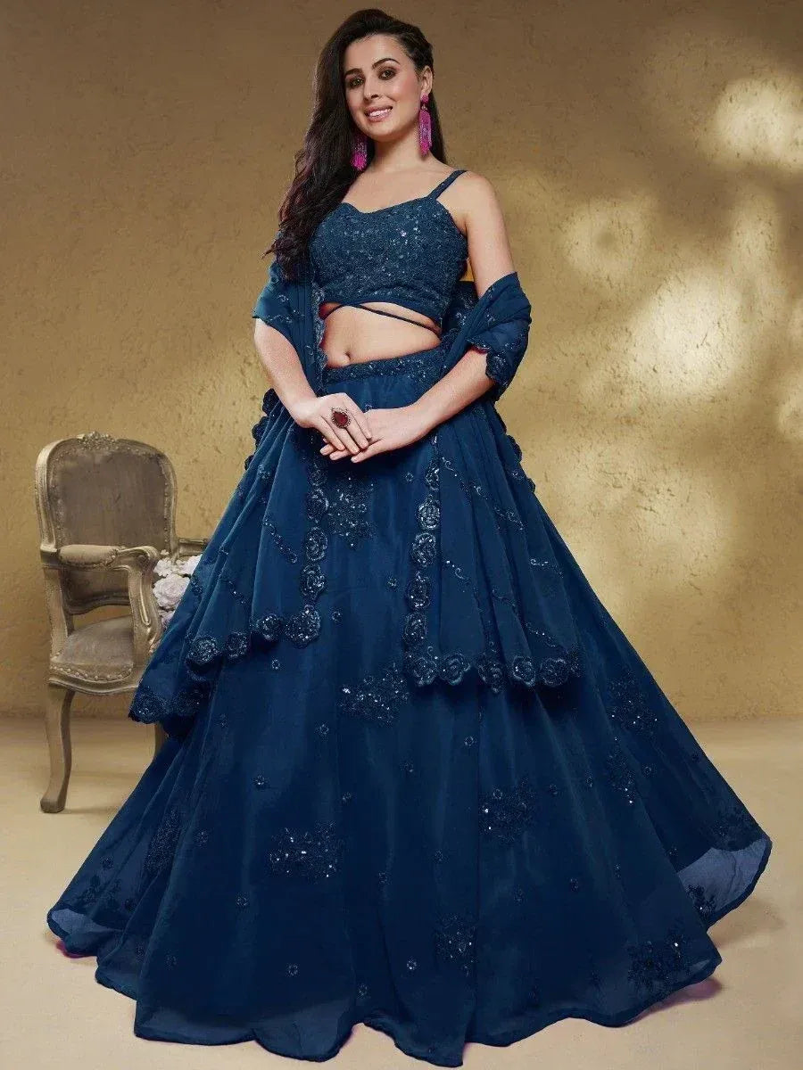 Navy blue designer lehenga choli with floral embroidery, perfect for Indian ethnic wear occasions